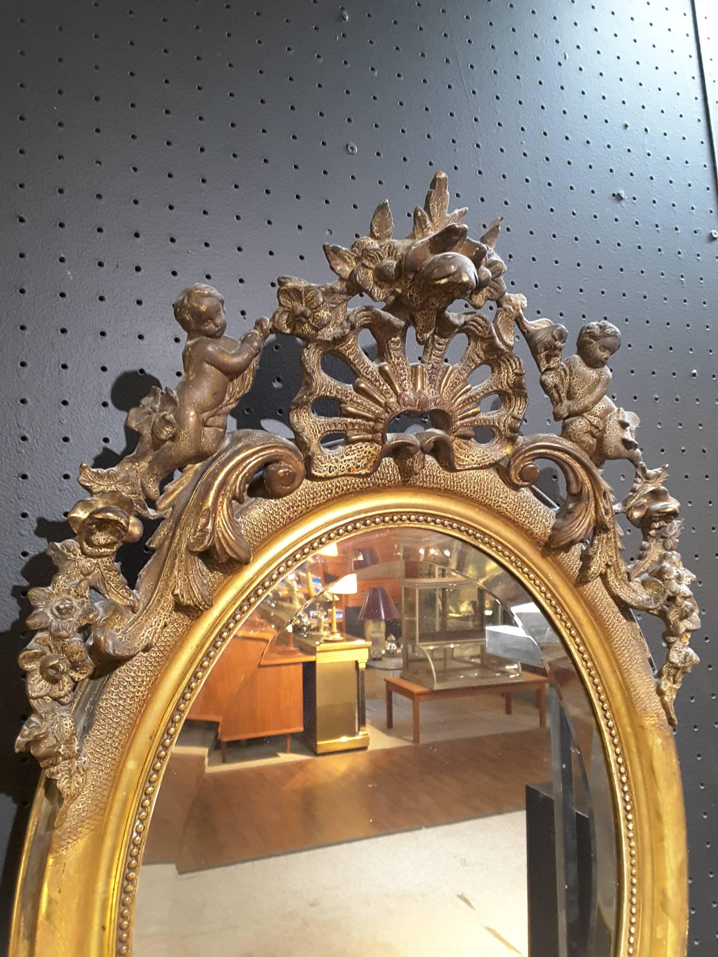 French Gilt Cherub Oval Bevelled Mirror, 19th Century In Good Condition In Ottawa, Ontario