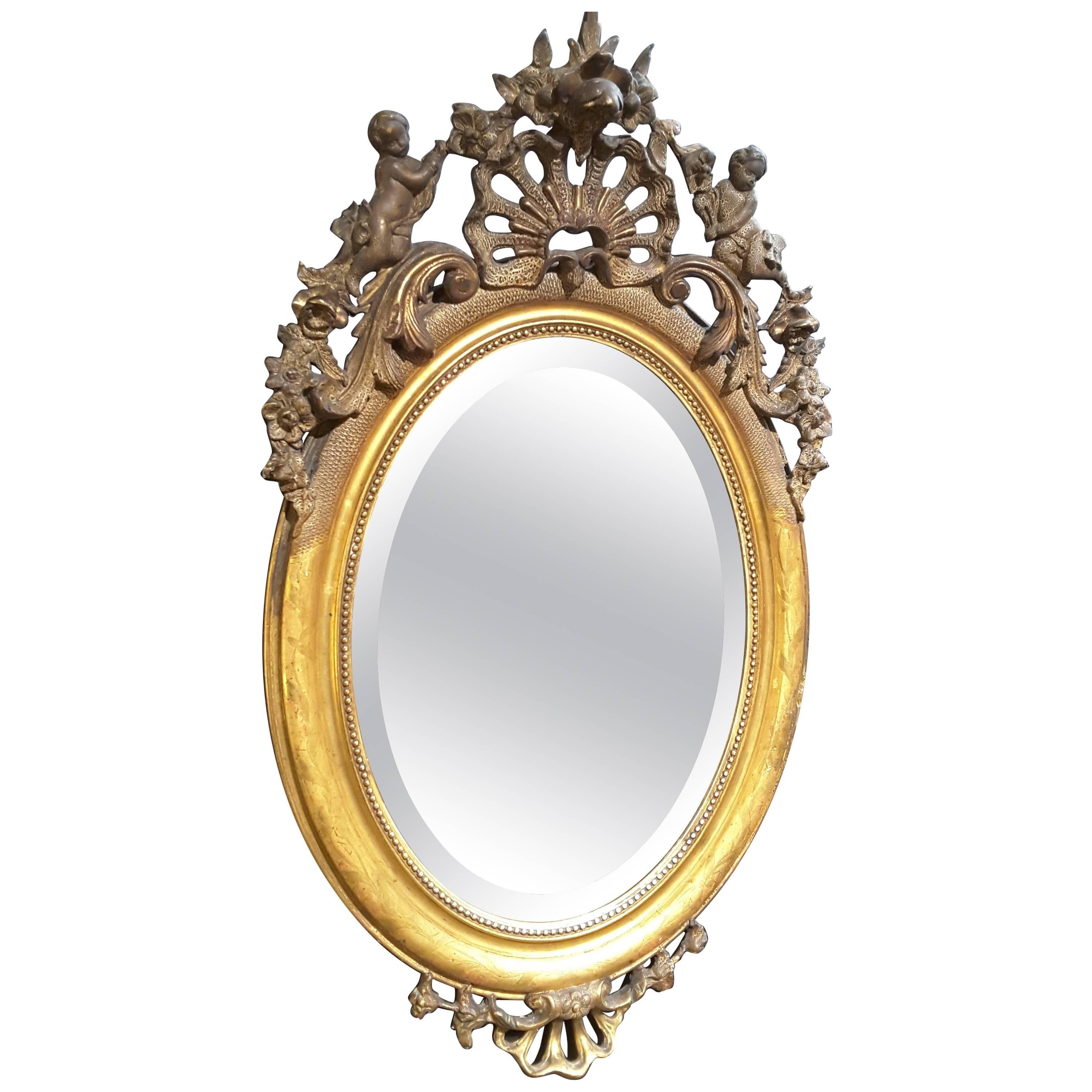 French Gilt Cherub Oval Bevelled Mirror, 19th Century