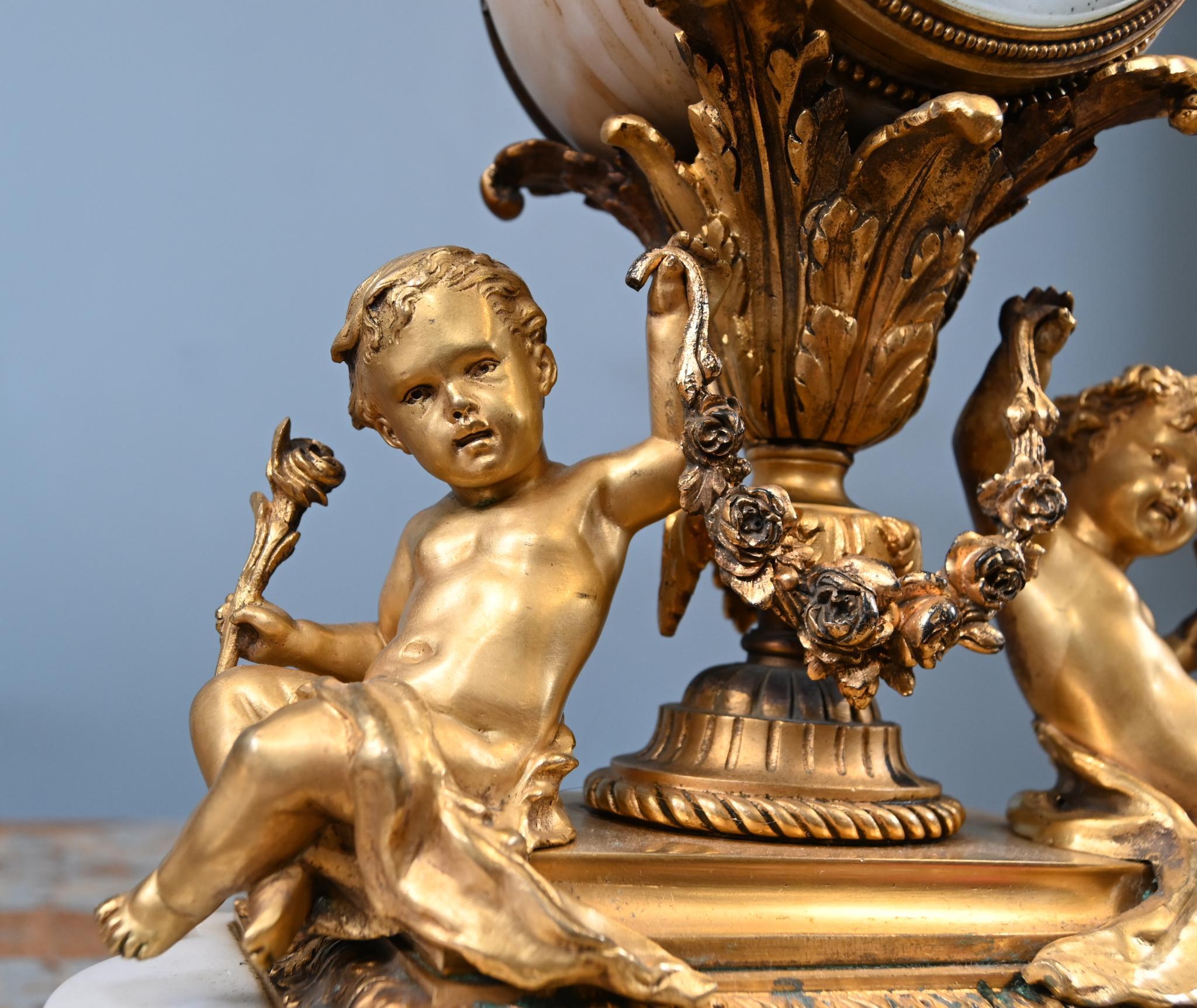 Giltwood French Gilt Clock Set Garniture Cherub Candelabras Louis XV For Sale