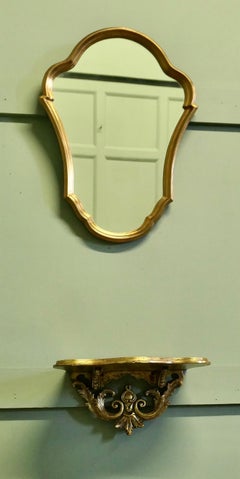 French Gilt Console Mirror with Matching Shelf This is a lovely unfussy piece