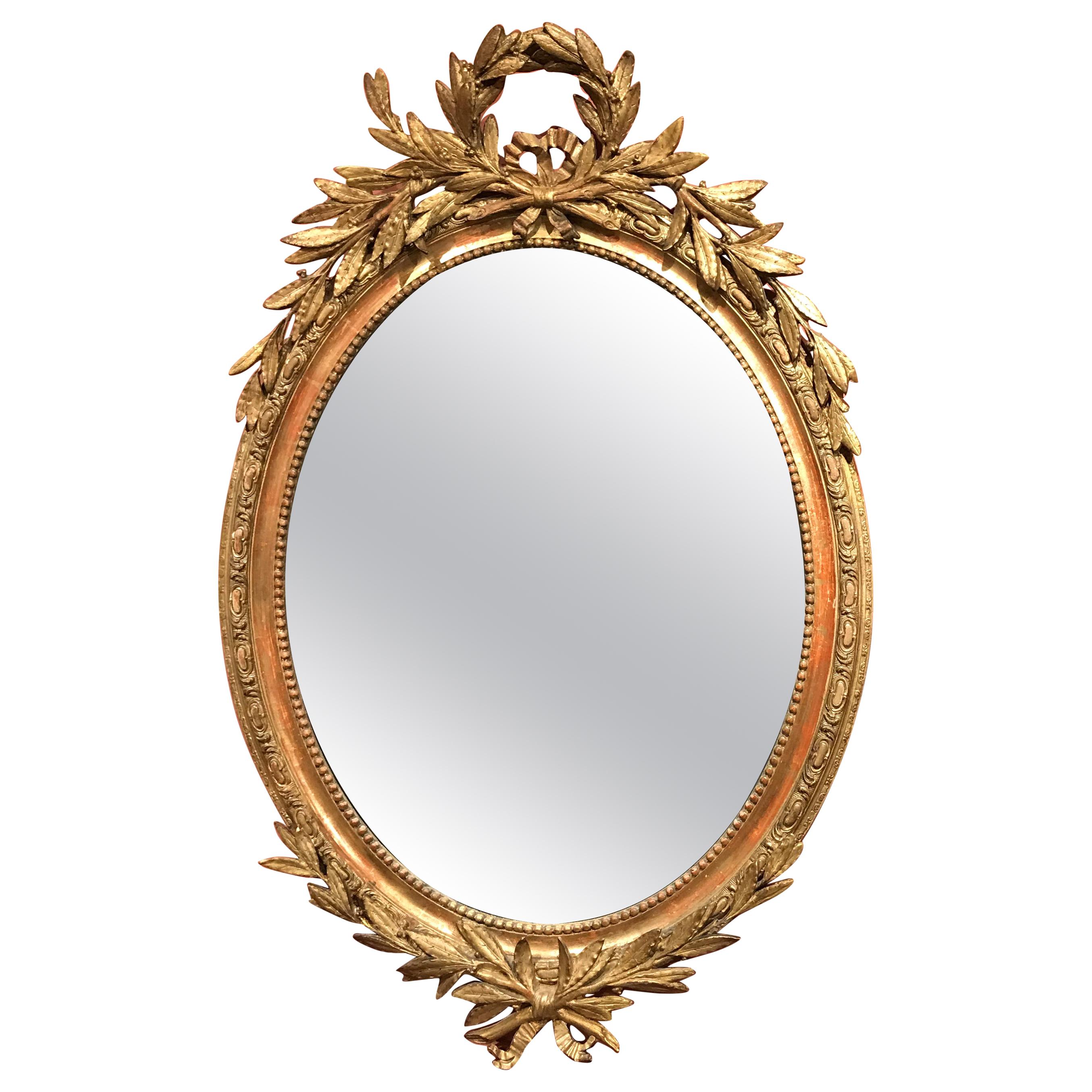 French Gilt Foliate Decorated Oval Wall Mirror, Early 19th Century