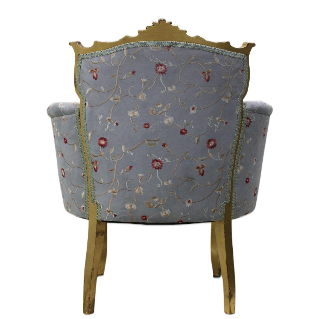 C. 20th century

French gilt framed armchair w/ floral upholstery.