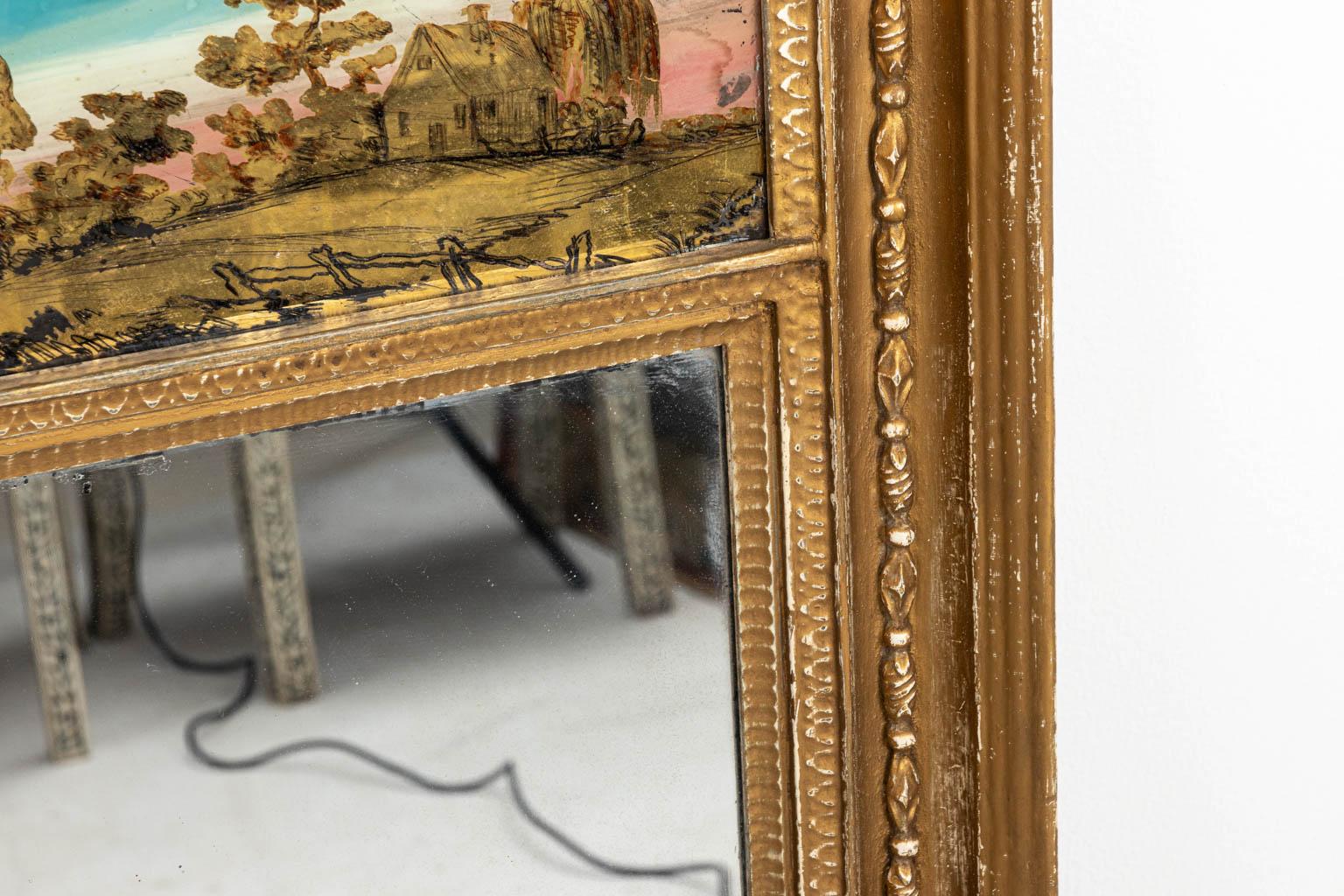 French gilt gesso mirror with églomisé glass Trumeau panel, circa 19th century. Please note of wear consistent with age including paint loss and gilt loss. There is also evidence of minor losses to the mirror plate. Made in France.