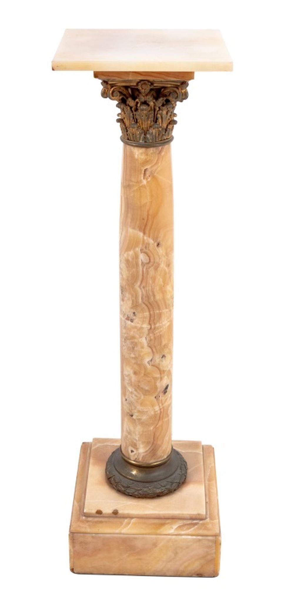 French Gilt Metal Mounted Alabaster Pedestal, late 19th century, the square revolving top above a Corinthian column, on a square stepped plinth. 44