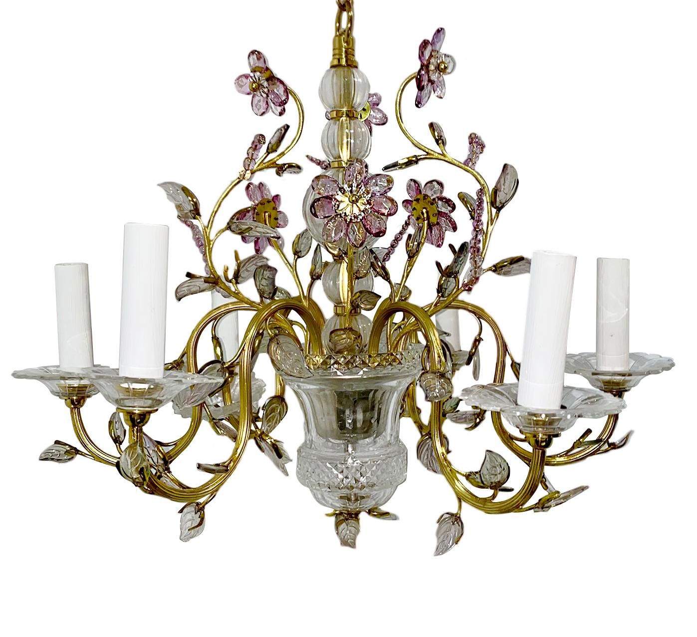 A circa 1950s French crystal chandelier with amethyst flowers and molded glass leaves.

Measurements:
Current drop: 22