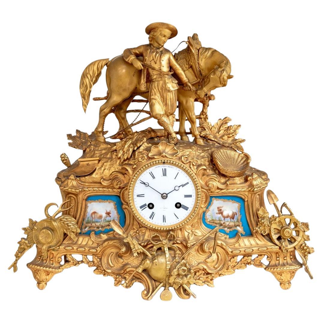 French Gilt Metal and Porcelain Figural Clock