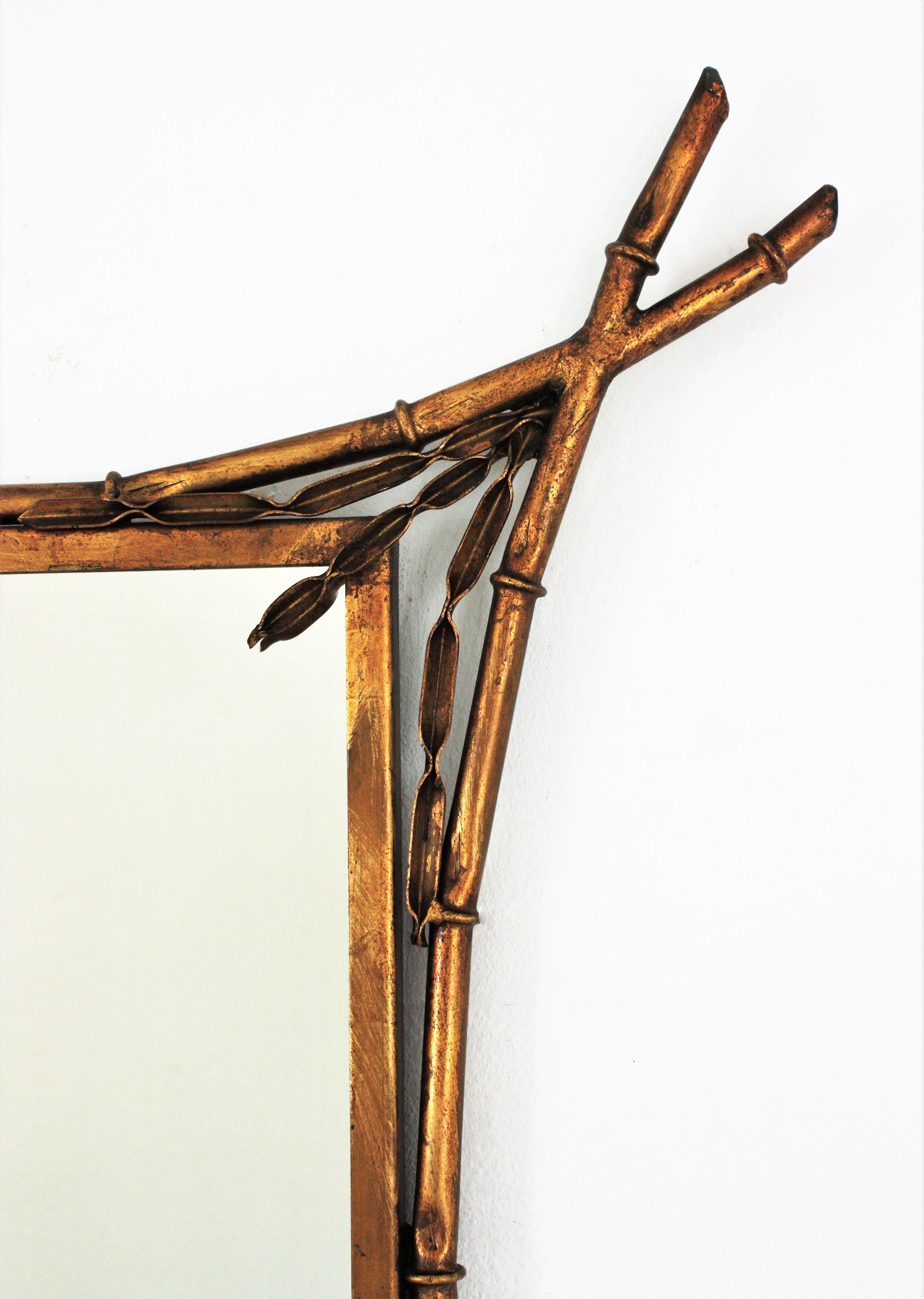 French Faux Bamboo Gilt Iron Wall Mirror with Leaf Details, Maison Baguès Style In Good Condition For Sale In Barcelona, ES