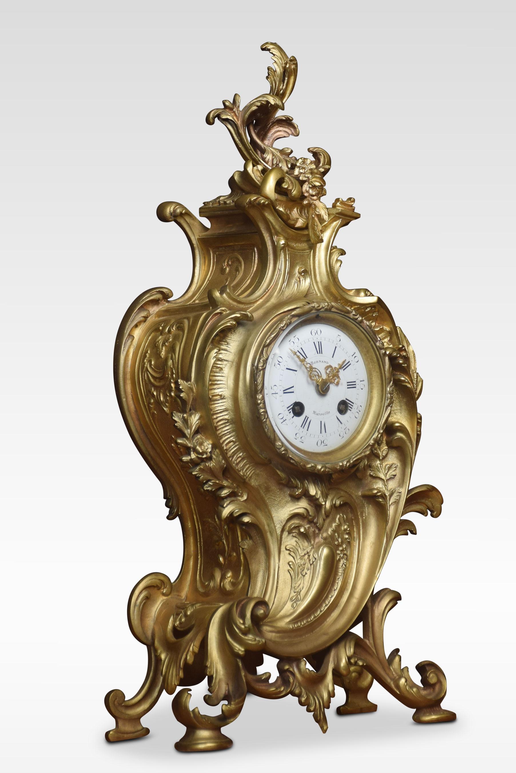 Late 19th century French gilt metal mantel clock, the white enamel dial Roman numerals, signed Bornand Marseilles. enclosing a two-train movement striking on a bell. Enclosed in cast foliate swept case.
Dimensions:
Height 19 inches
Width 9