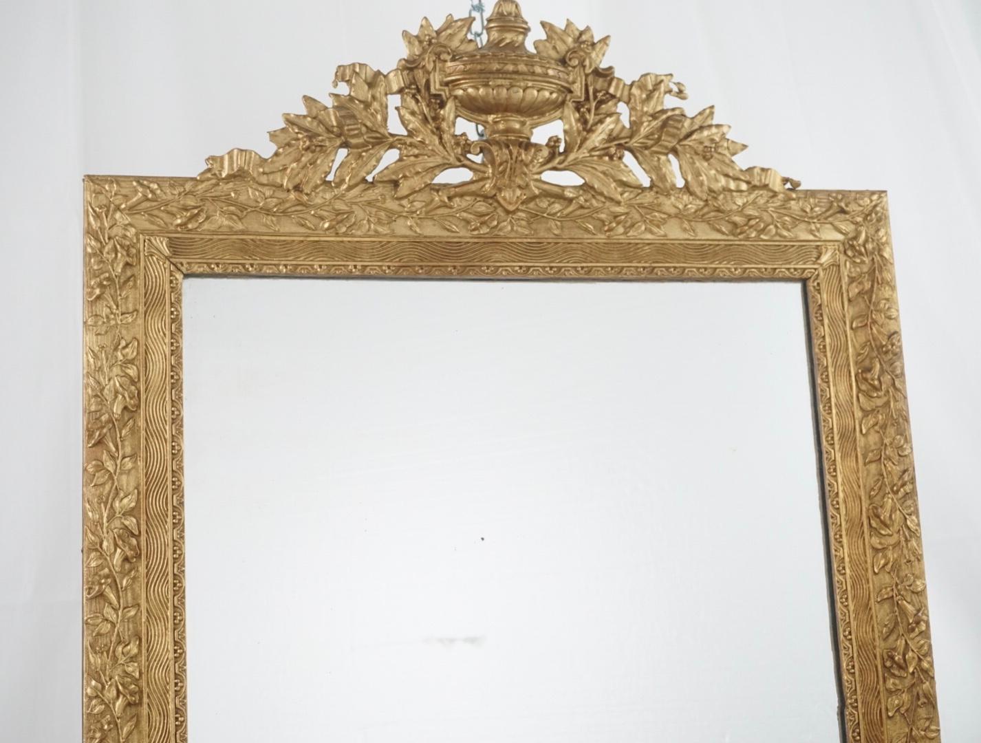 French gilt Louis XVI style carved wood, in excellent conditions, some wear but is minor due to aging other than that in great condition.
 
