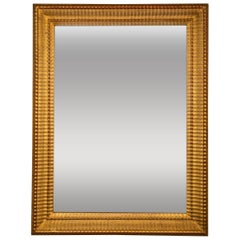 Miroir français du 19ème siècle doré avec bordure ondulée