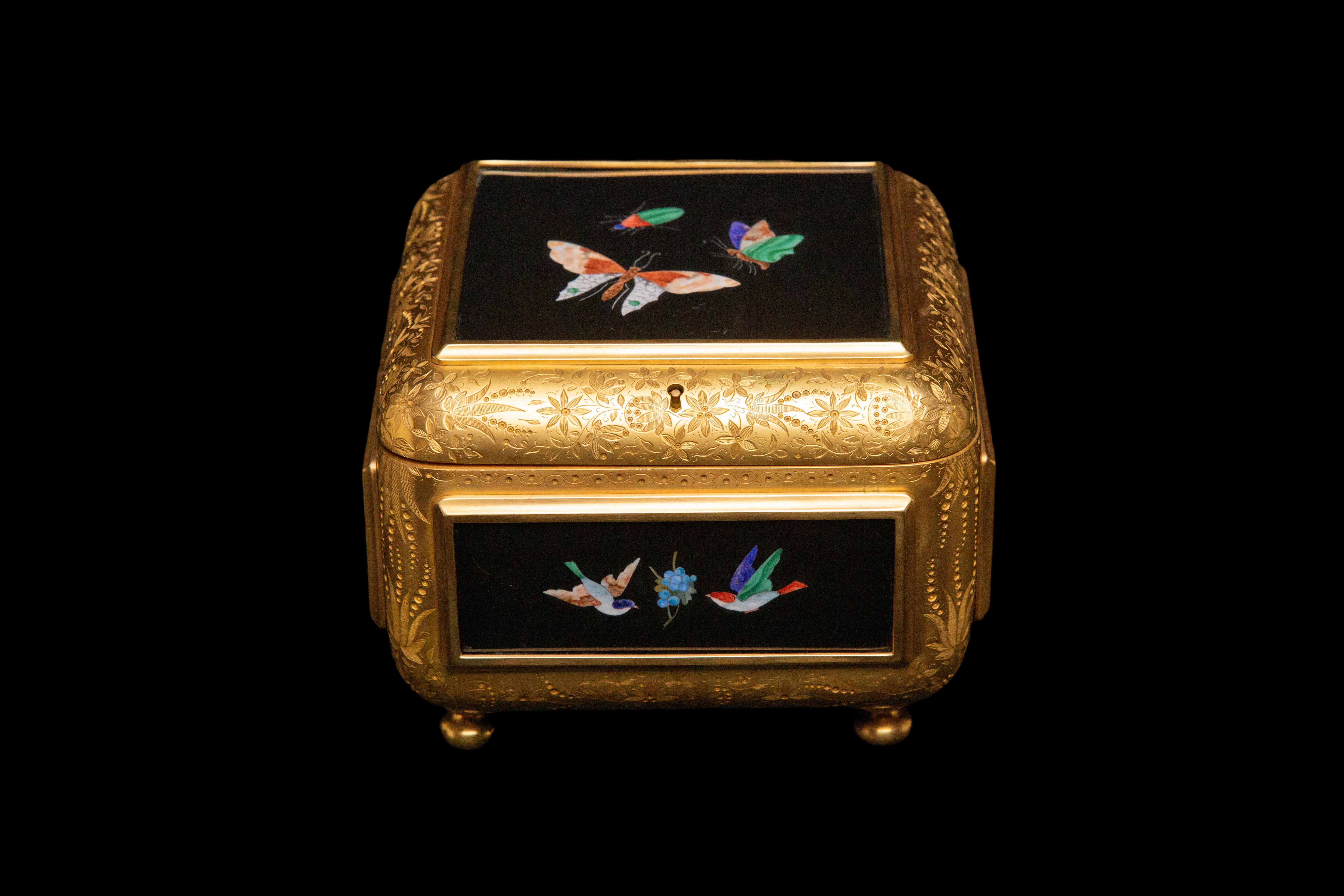 French Gilt Engraved Bronze Box From the 19th Century:

With Pietra Dura Panels Illustrating Butterflies Birds and Insects

Measures: 7