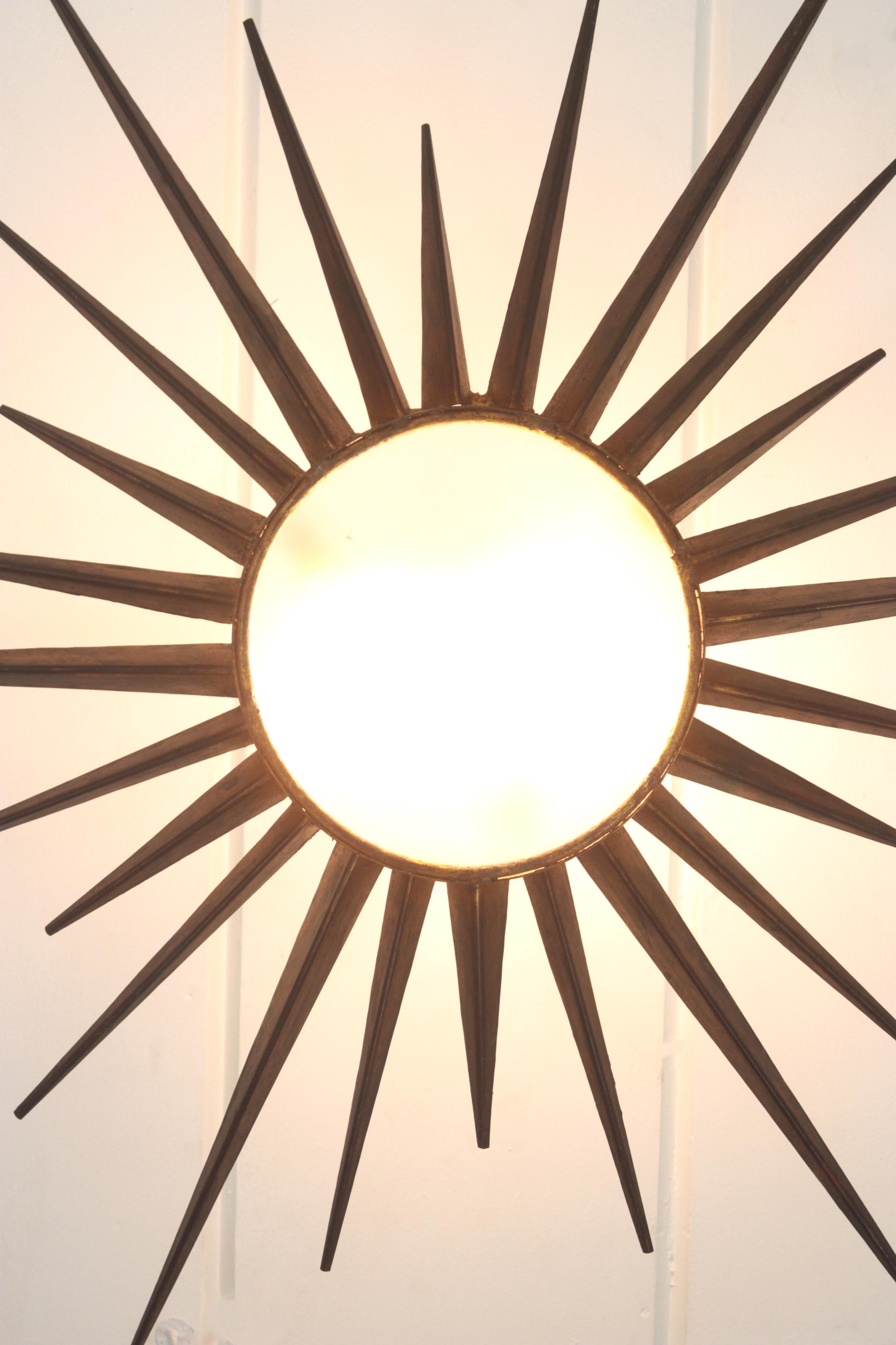 French Gilt Starburst Sunburst Light Fixture in Wrought Iron, Poillerat Style For Sale 7