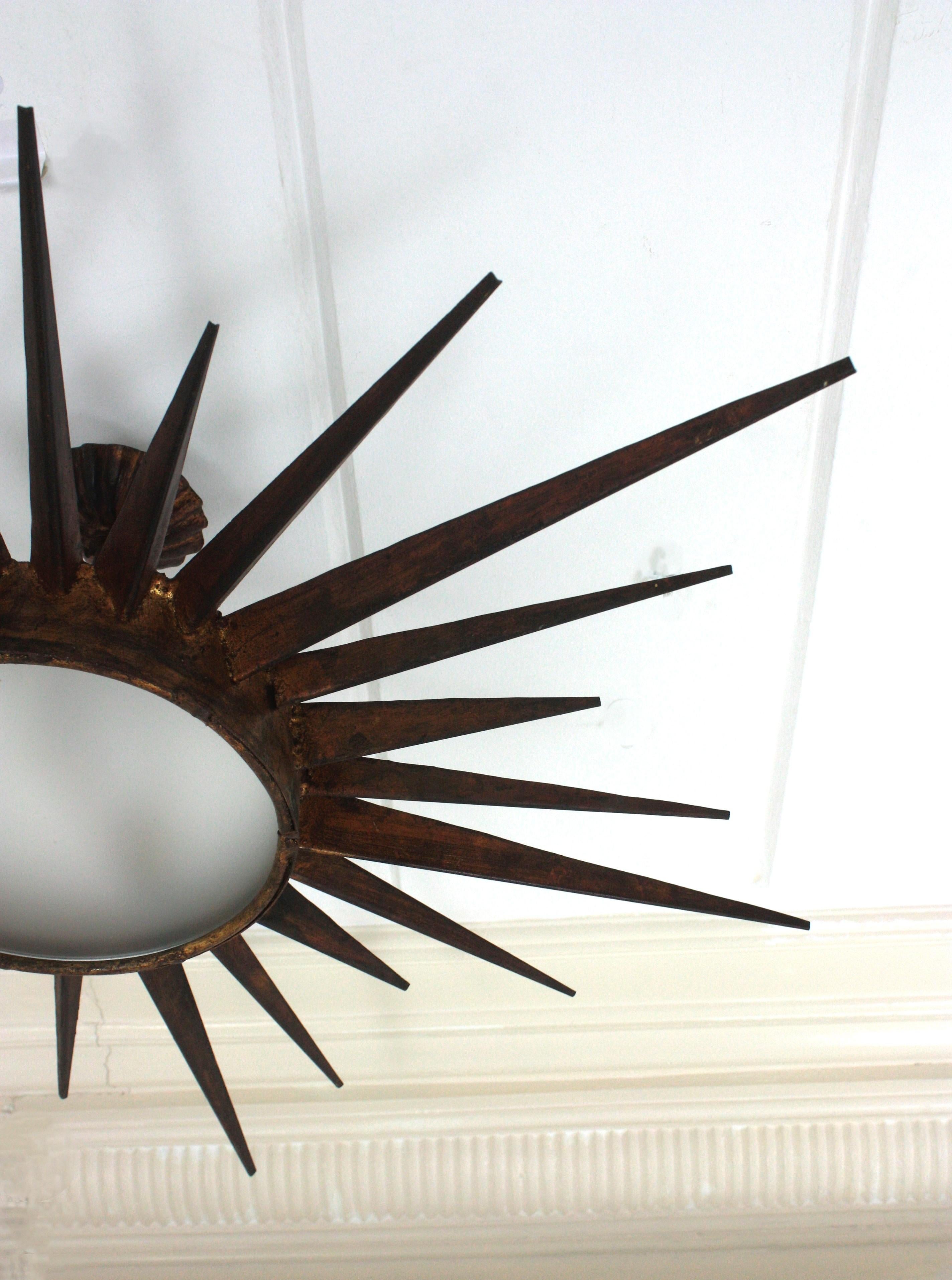 French Gilt Starburst Sunburst Light Fixture in Wrought Iron, Poillerat Style For Sale 11