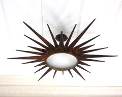 Starburst Sunburst Light Fixture in Gilt Wrought Iron, Poillerat Style, 1940s