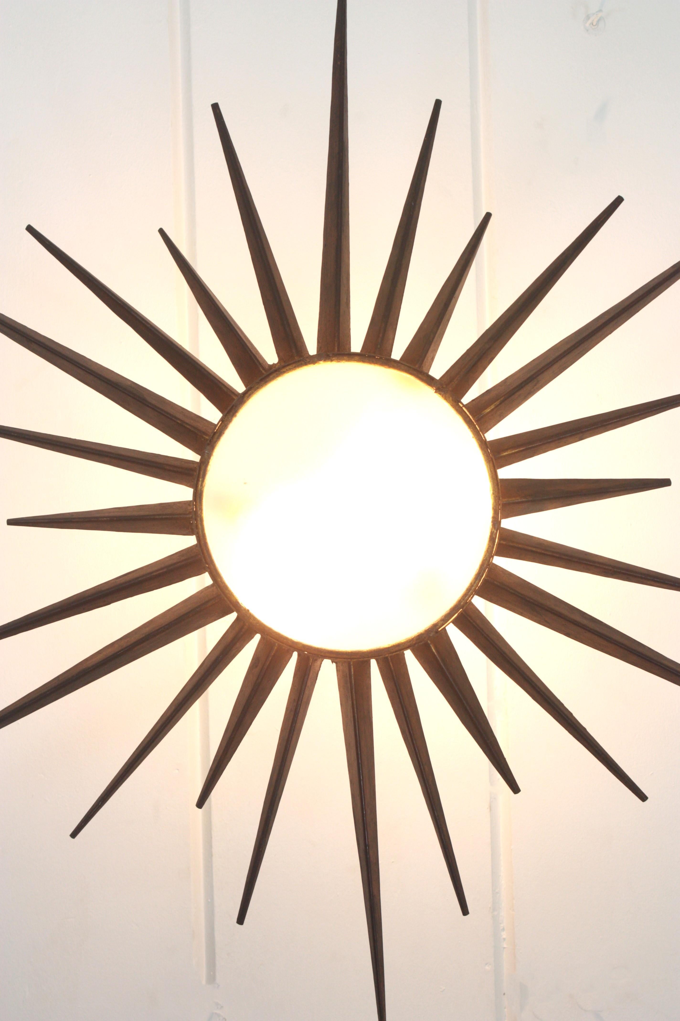 French Gilt Starburst Sunburst Light Fixture in Wrought Iron, Poillerat Style For Sale 1