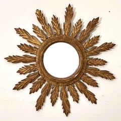 Specchio convesso dorato francese a raggiera o a stella (diametro 28 1/8)
