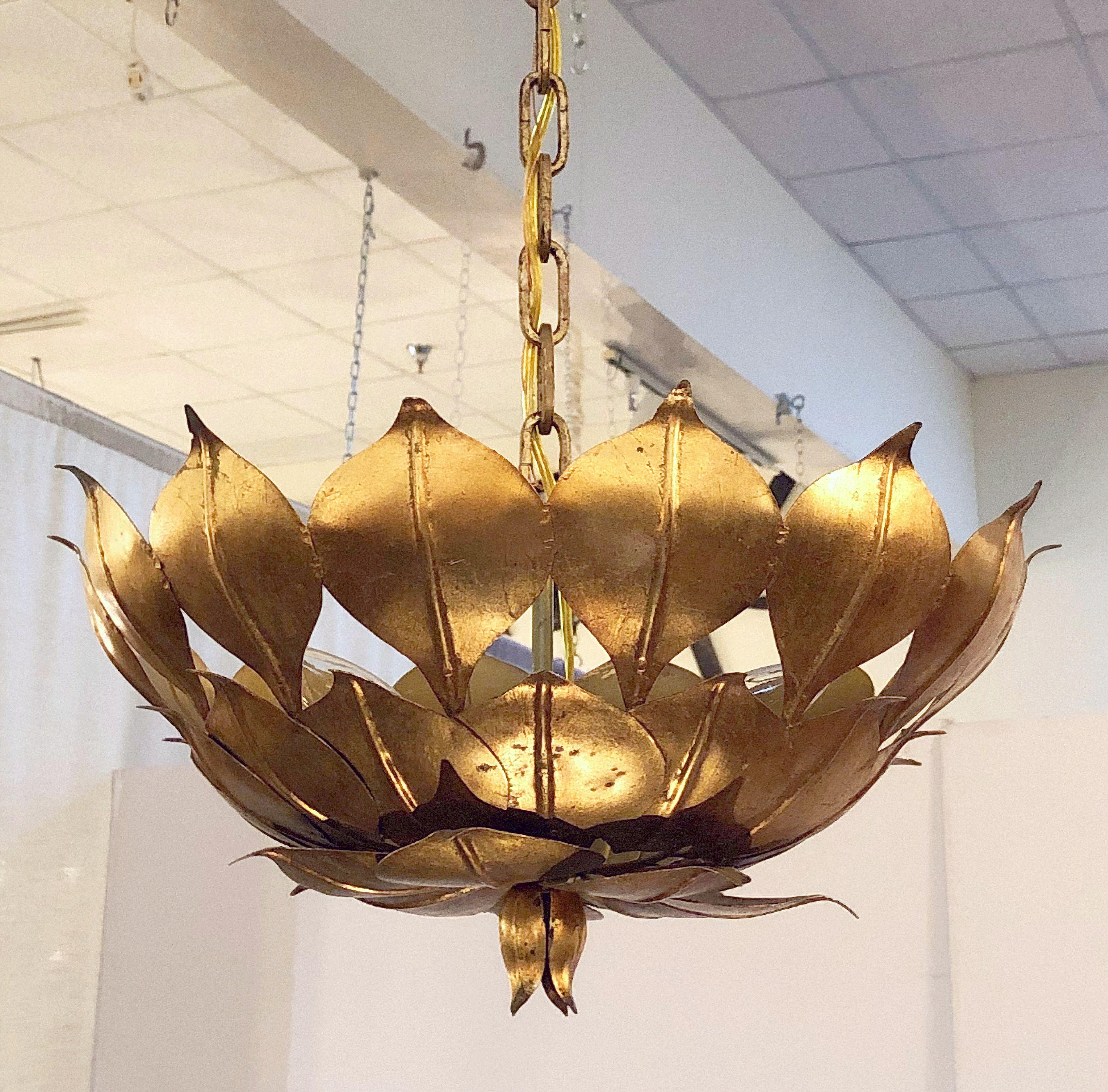 A handsome French three-light hanging light fixture or chandelier (18 inches diameter) of gilt metal featuring a lotus leaves or layered leaf design, with down-facing finial.

U.S. wired, Ready for display.