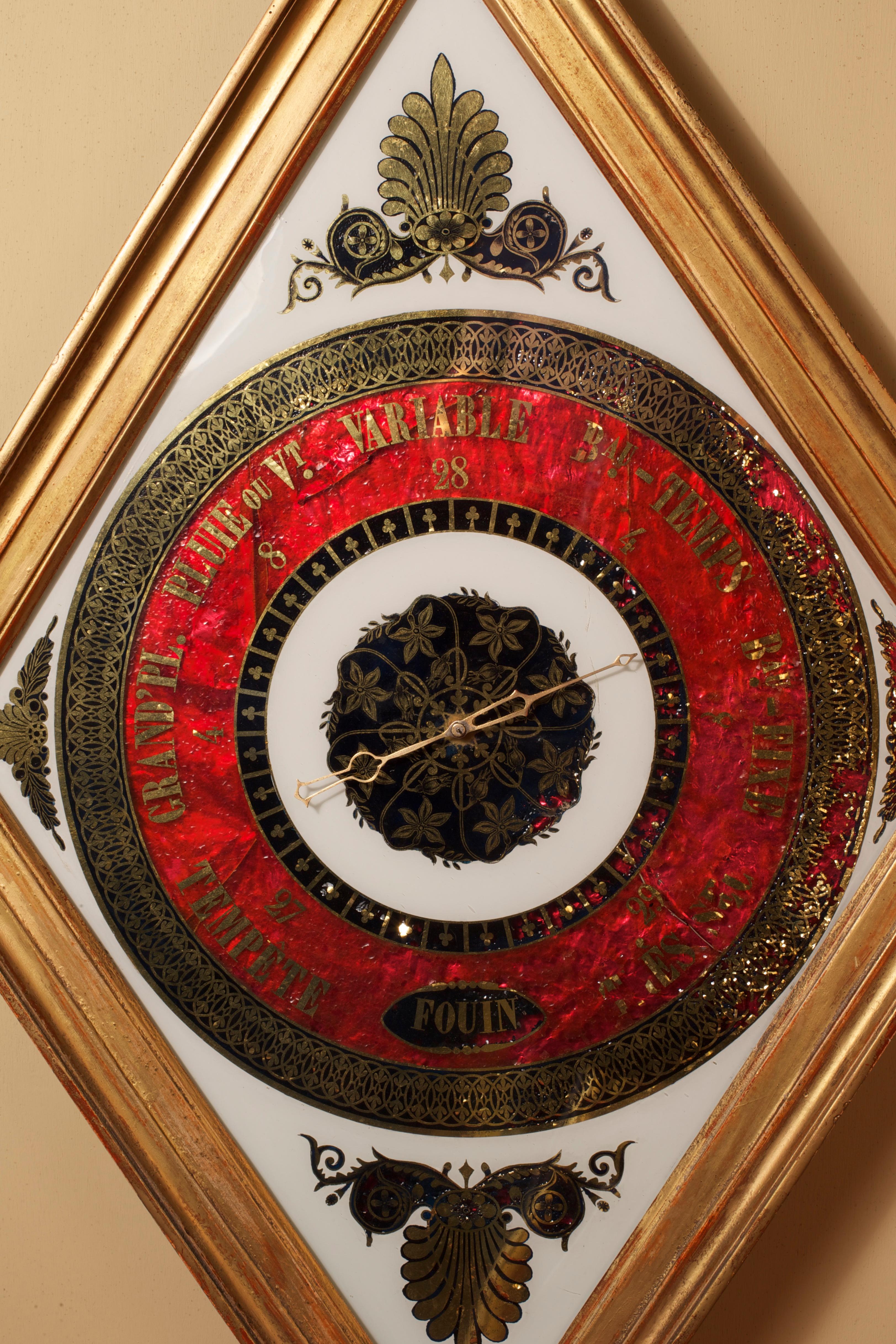 Französisches vergoldetes Diamantbarometer mit Verre Eglomise-Zifferblatt mit sieben Wetteranzeigen und originalem Zeiger, signiert 'Fouin', um 1830.