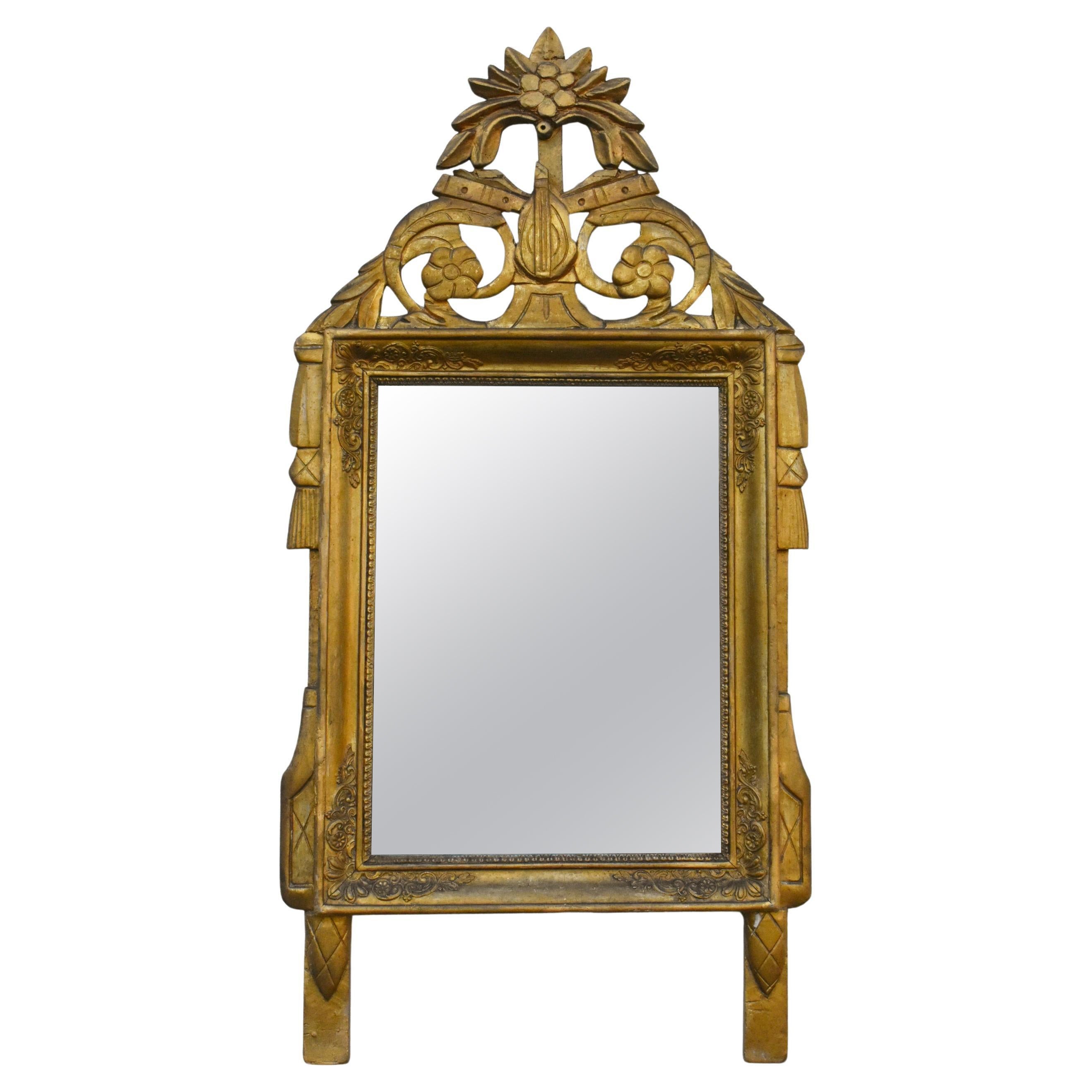 Miroir mural en bois doré de style Louis XVI, époque Directoire en vente
