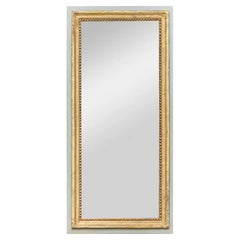 Miroir rectangulaire en bois doré et peint, vers 1920