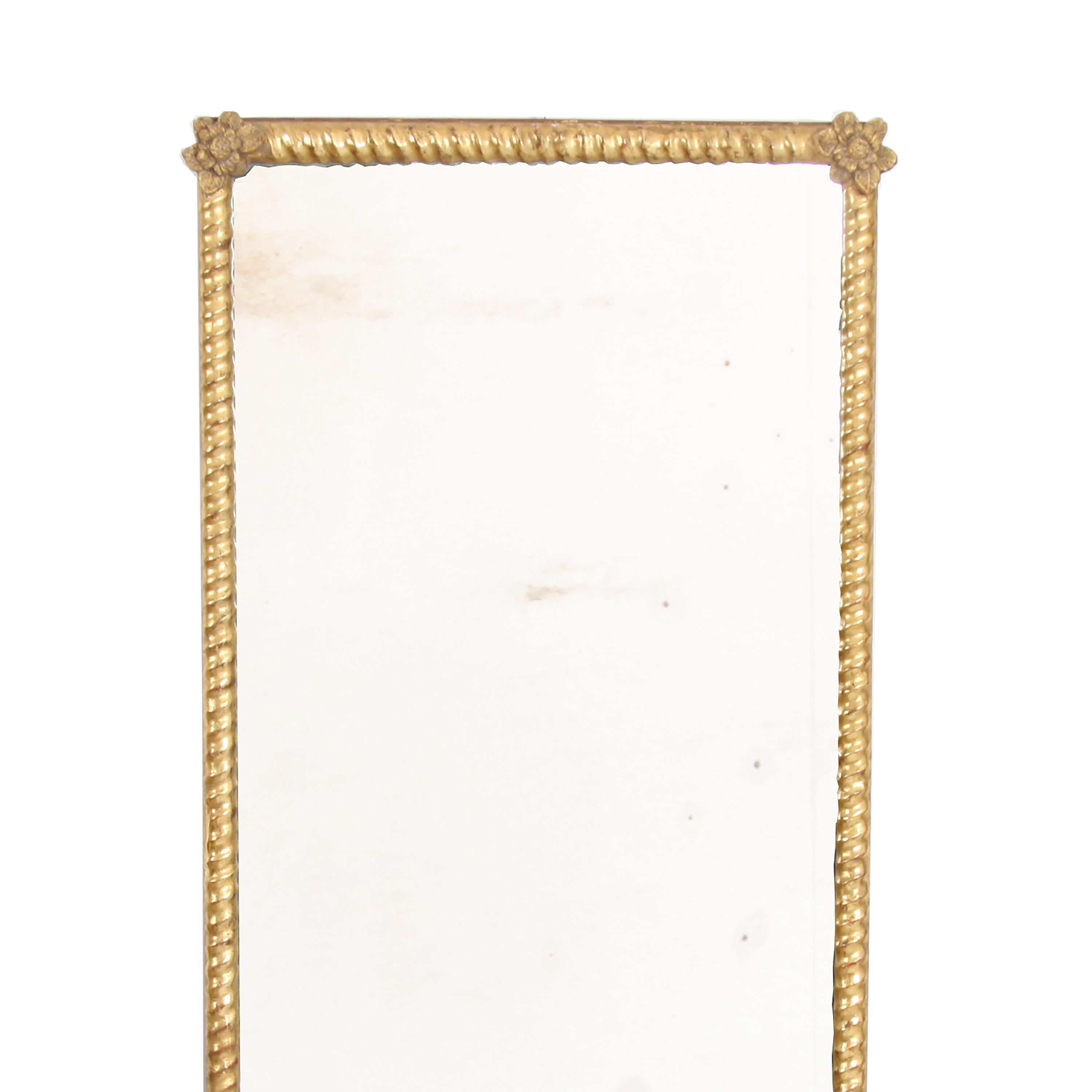 French 19th century giltwood mirror with a rope twist profile and moulded flowers to the corners. Beautiful sparkly, original mercury plate.