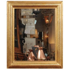 French Giltwood Rectangular Mirror with Ribbed Frame from the 19th Century