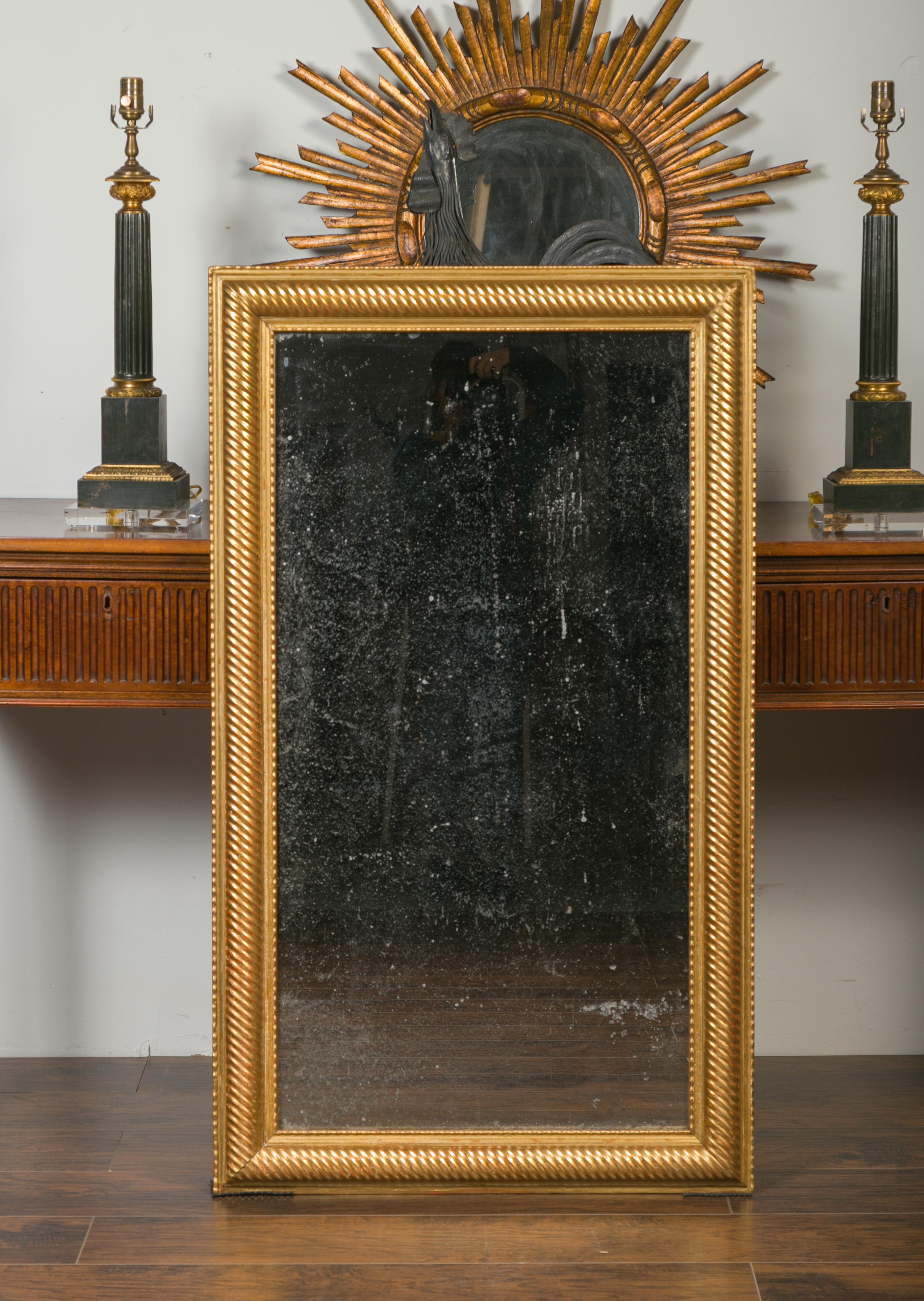 Carved French Giltwood Rectangular Mirror with Twisted Motifs, circa 1900 For Sale