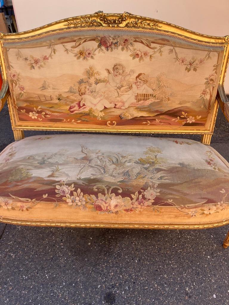 Good Louis XVI style gilt wood settee with original tapestry in very good condition
Very good value for the money
in great condition
A Louis XVI style carved gilt wood settee covered in its original tapestry which is in wonderful condition
The