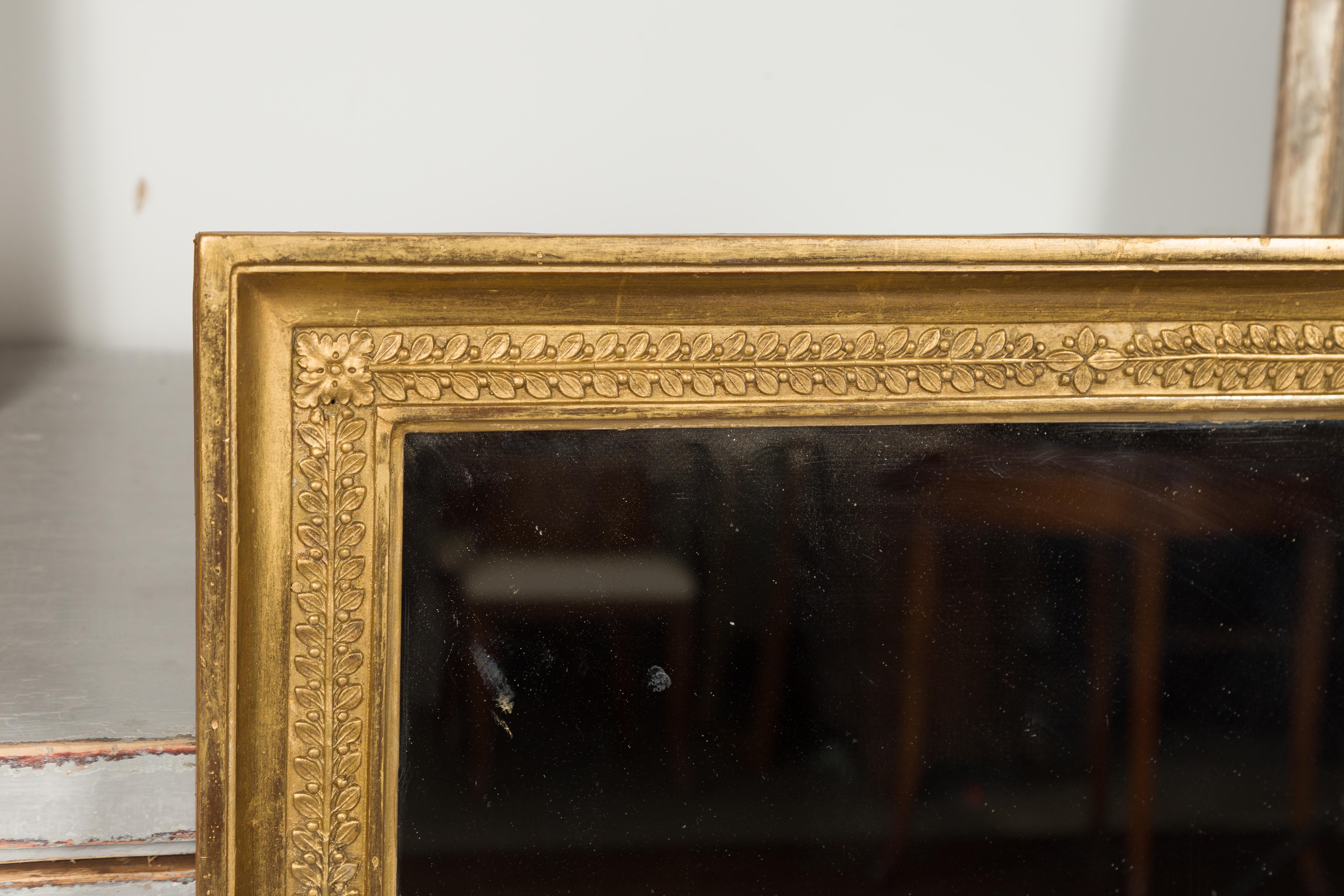 20th Century French Giltwood Split Glass Mirror with Carved Foliage and Rosettes, circa 1900