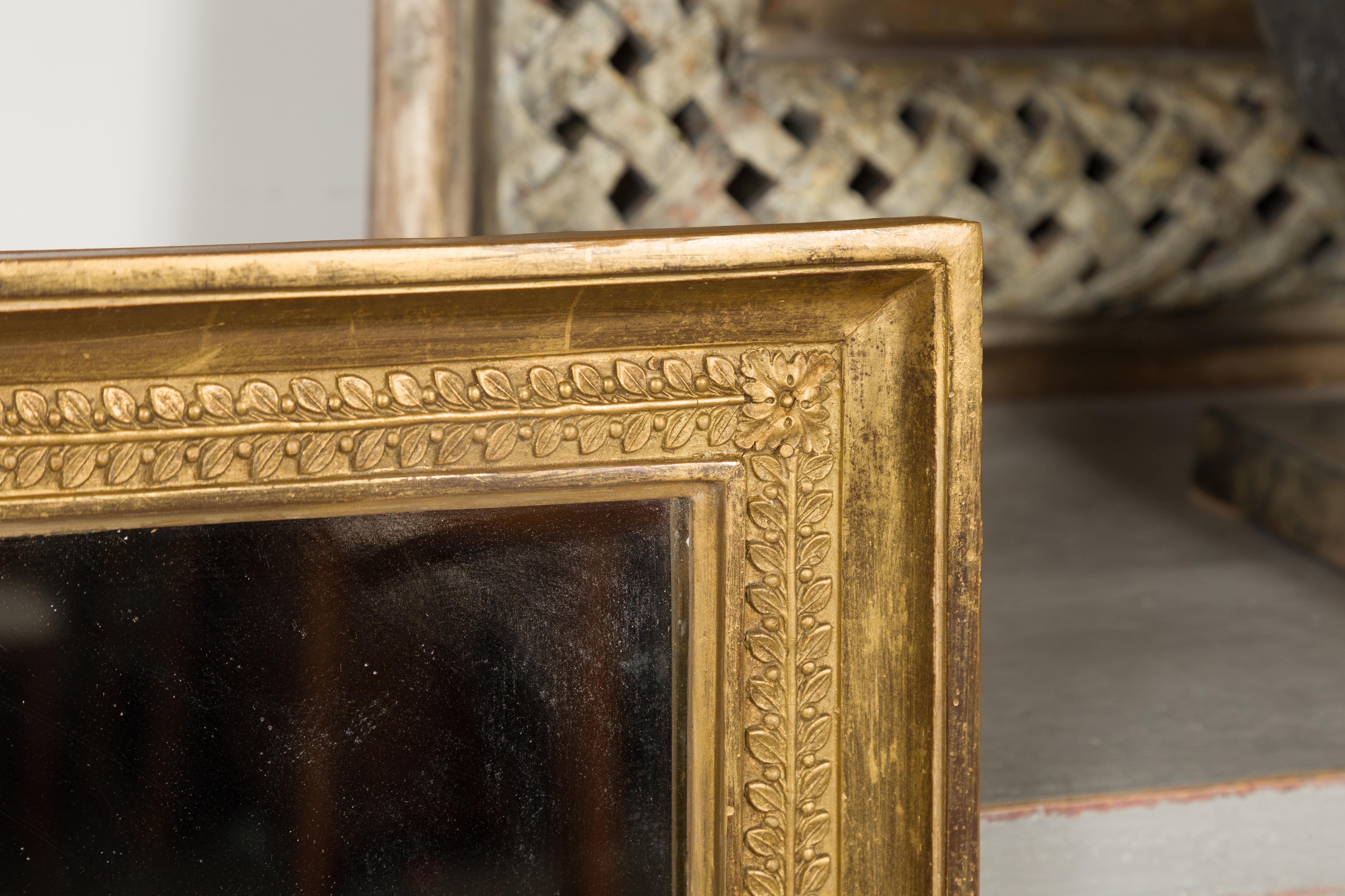 French Giltwood Split Glass Mirror with Carved Foliage and Rosettes, circa 1900 1