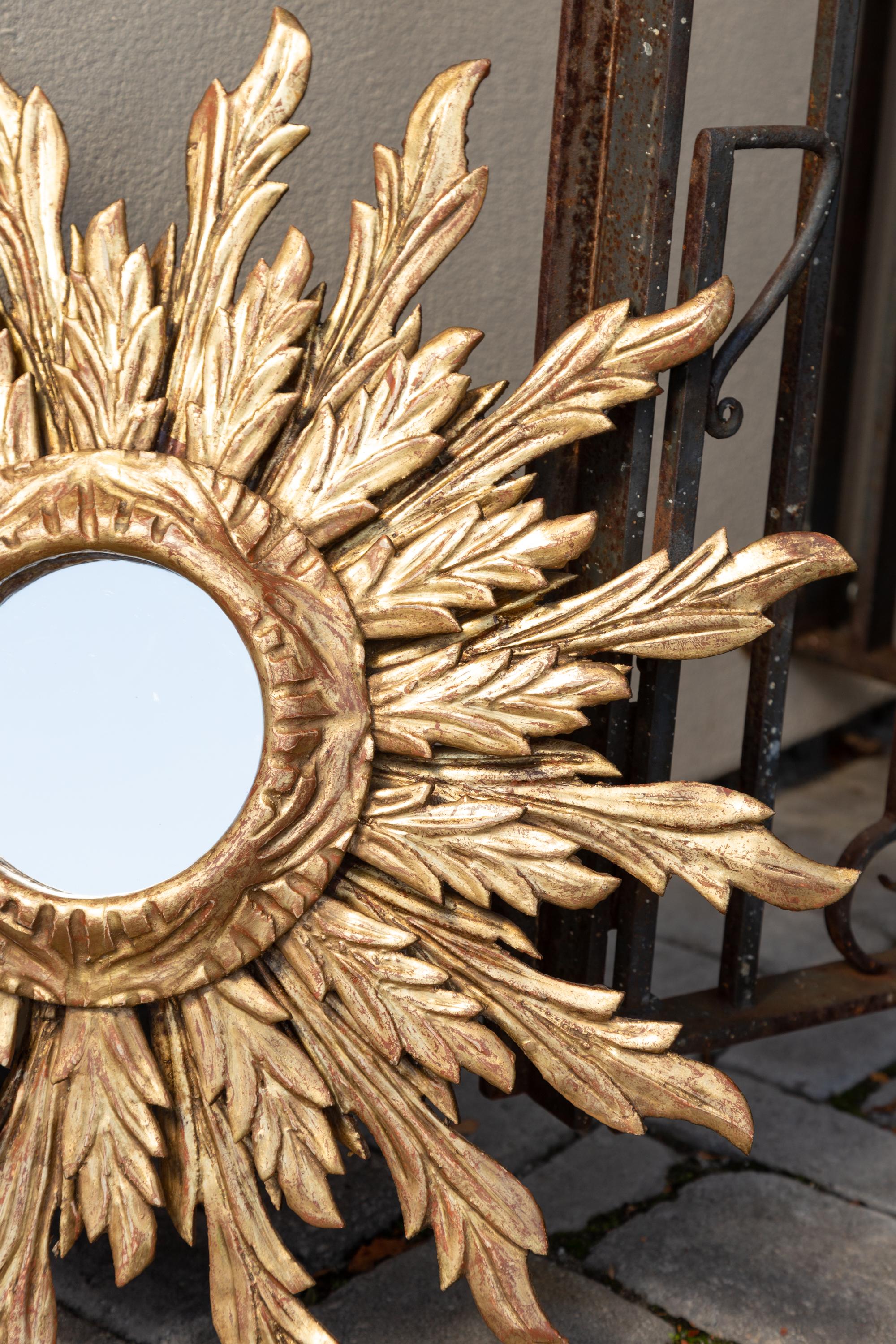 French Giltwood Sunburst Mirror with Wavy Sunrays from the Mid-20th Century 3