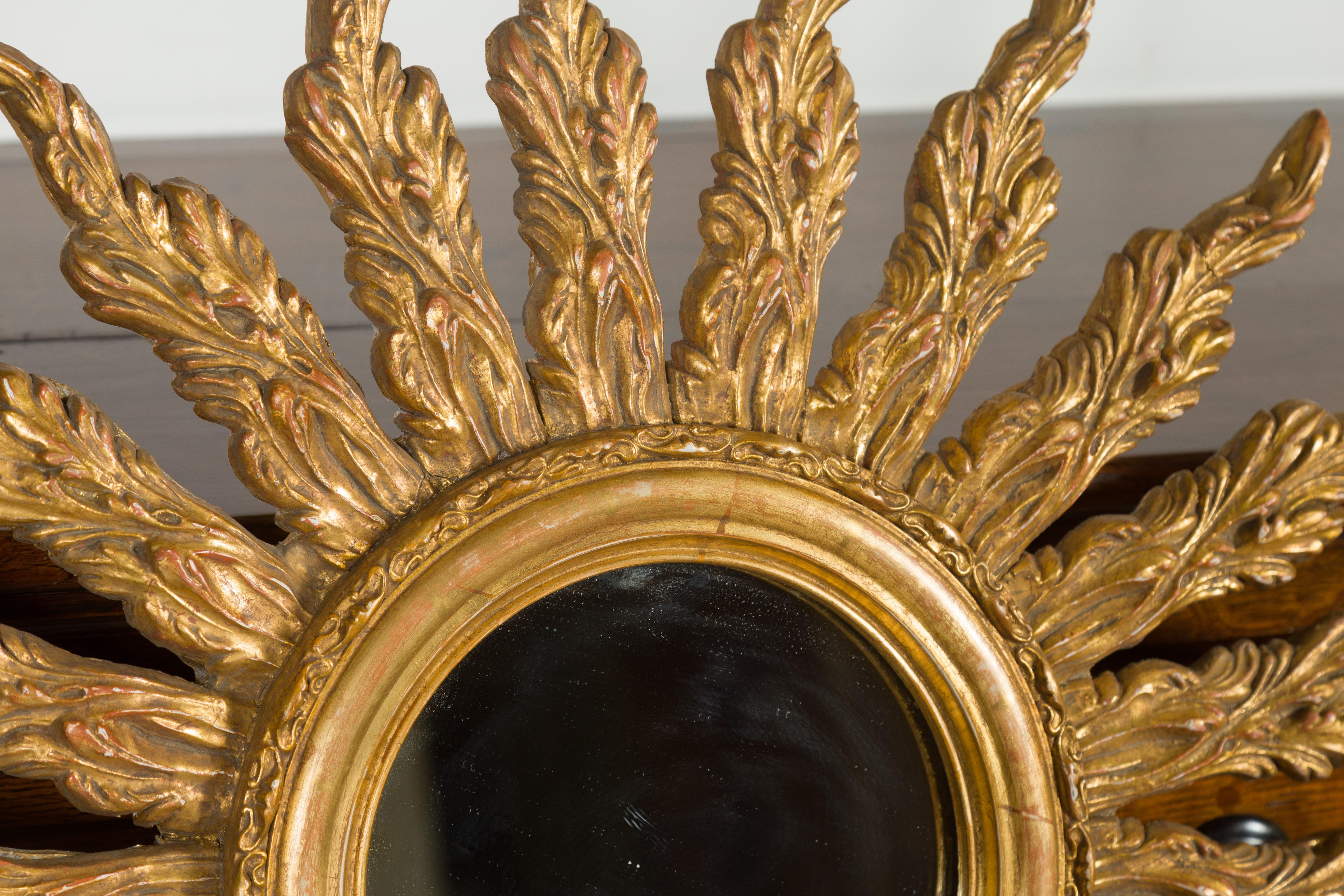 French Giltwood Sunburst Mirror with Wavy Sunrays from the Mid-20th Century For Sale 3