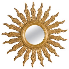 Miroir en bois doré à rayons de soleil ondulés du milieu du 20e siècle