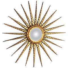 Miroir convexe en bois doré en forme de soleil et d'étoile