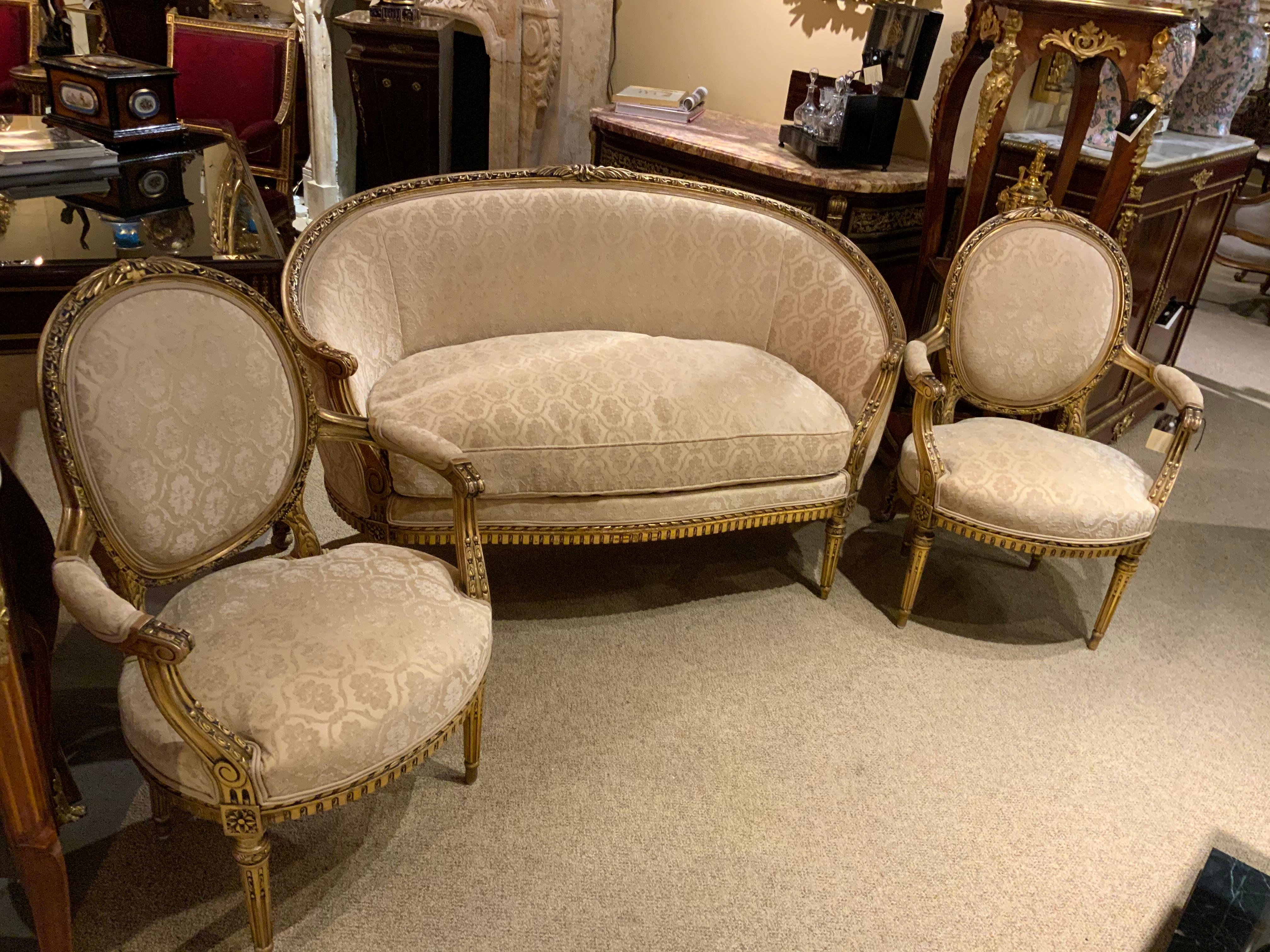 Louis XVI French Giltwood Three Piece Love Seat with Two Arm Chairs in Cream Hue For Sale