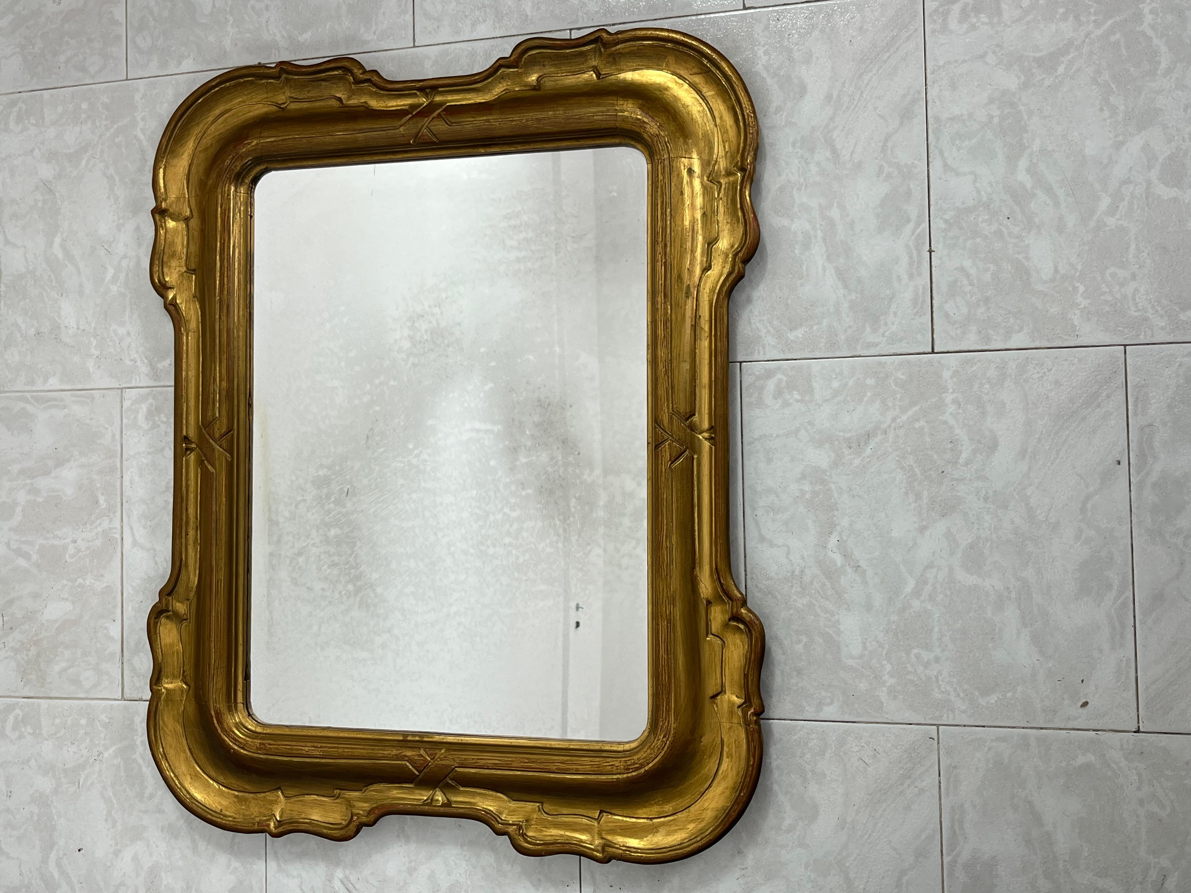 French giltwood wall mirror 1950s
The mirror has the classic patina of time.
Good condition.