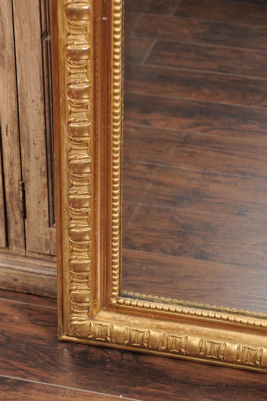 French Giltwood Wall Mirror with Carved Frame and Beaded Motifs, circa 1900 1