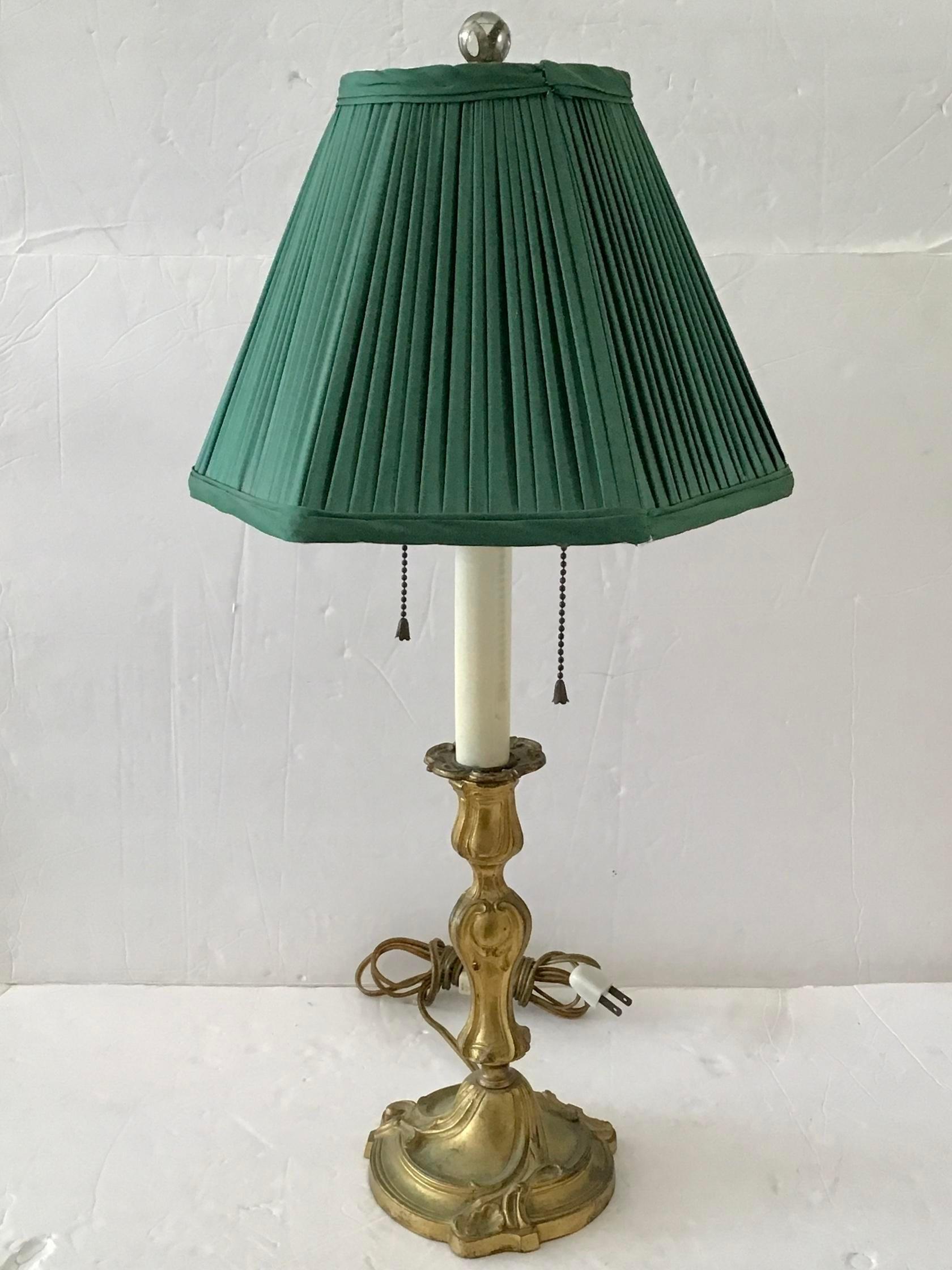 Beautiful French Gilt bronze table lamp with Green fabric shade. Gorgeous details with nice gilt tone. Add some French style to your home.