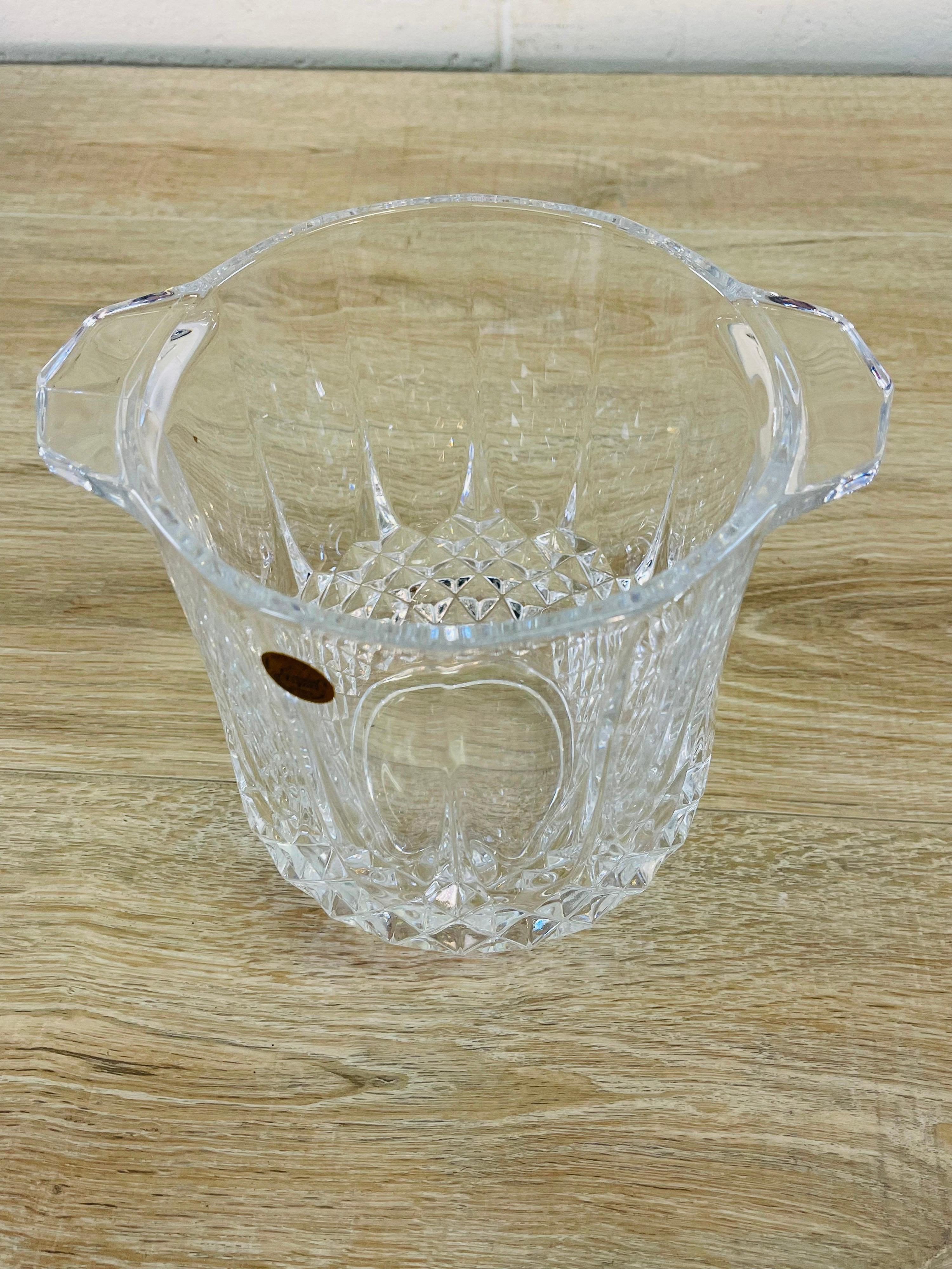 Vintage French crystal glass textured ice bucket. The bucket is a heavy glass with a diamond design. Marked.