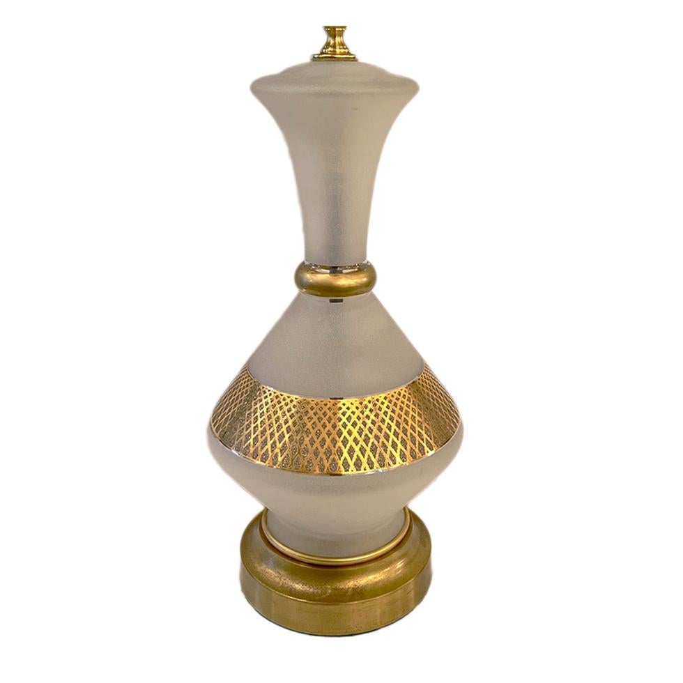 A circa 1950's French glass lamp with gilt details

Measurements:
Height of body: 15.75