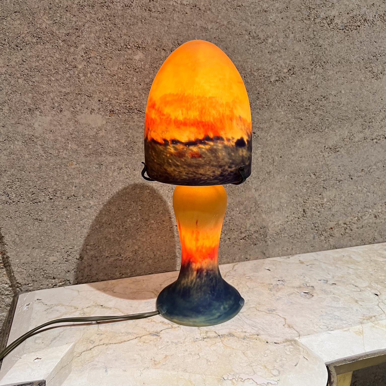 French Glass Paste Table Lamp Lumières de la Ville
nancy art nouveau
glass coloring technique invented by Emile Gallé
mushroom lamp stem base
11.75 x 5.25 diameter
Original vintage
New plug ready for US. Tested and working.
Refer to images