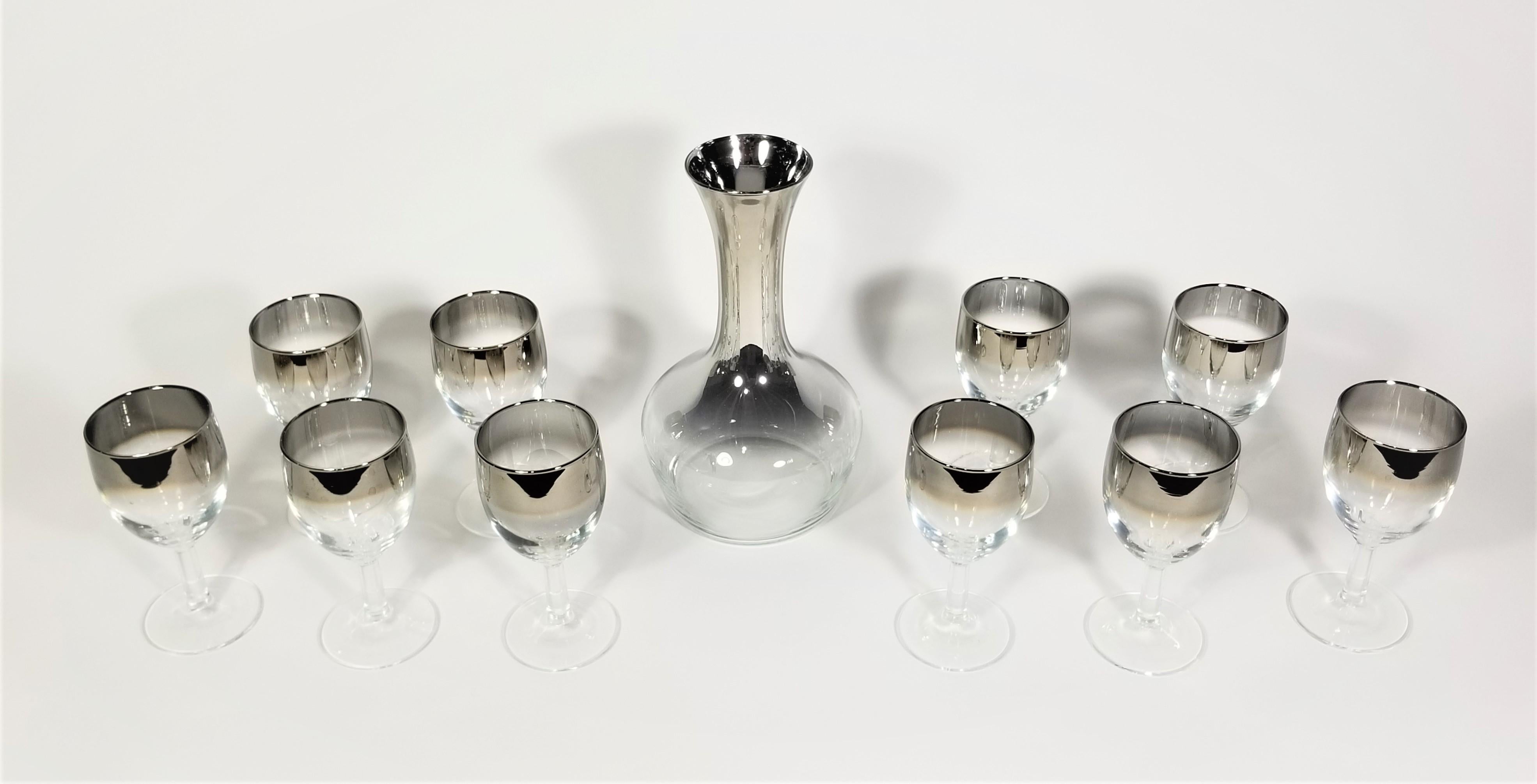 French mid-century 1960s glassware barware. Silver fade Design in style of Dorothy Thorpe. Set of 8 wine or cordial glasses with matching carafe. All glasses marked France. 

Measurements:
Decanter height: 8.5 inches
Decanter diameter: 5.0