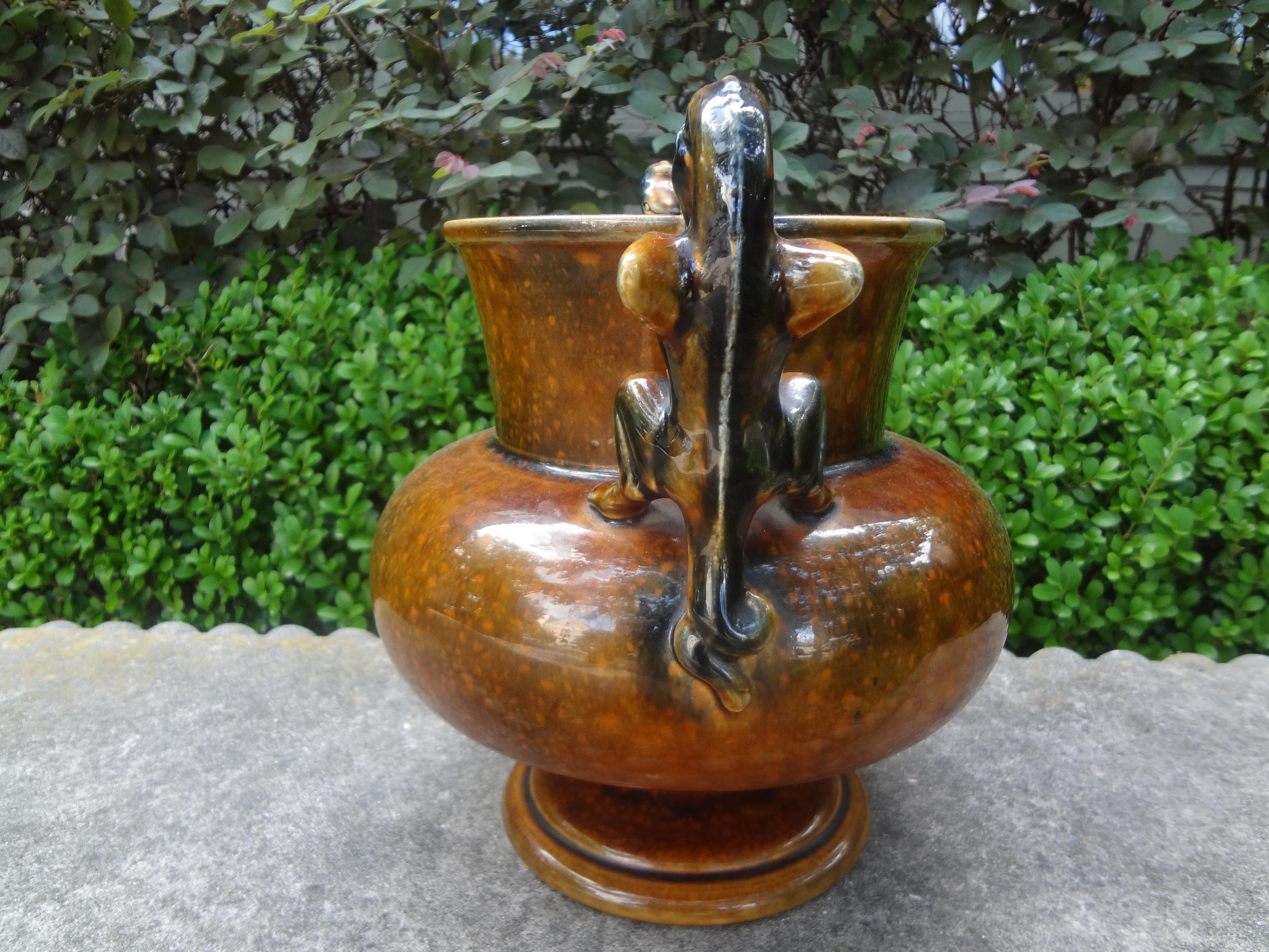 French Sarreguemines style glazed ceramic urn with griffin handles.
Handsome French sarreguemines style glazed ceramic urn, vase vessel with griffin handles. This interesting barbotine style urn has beautiful glaze and dates to the 1920s.