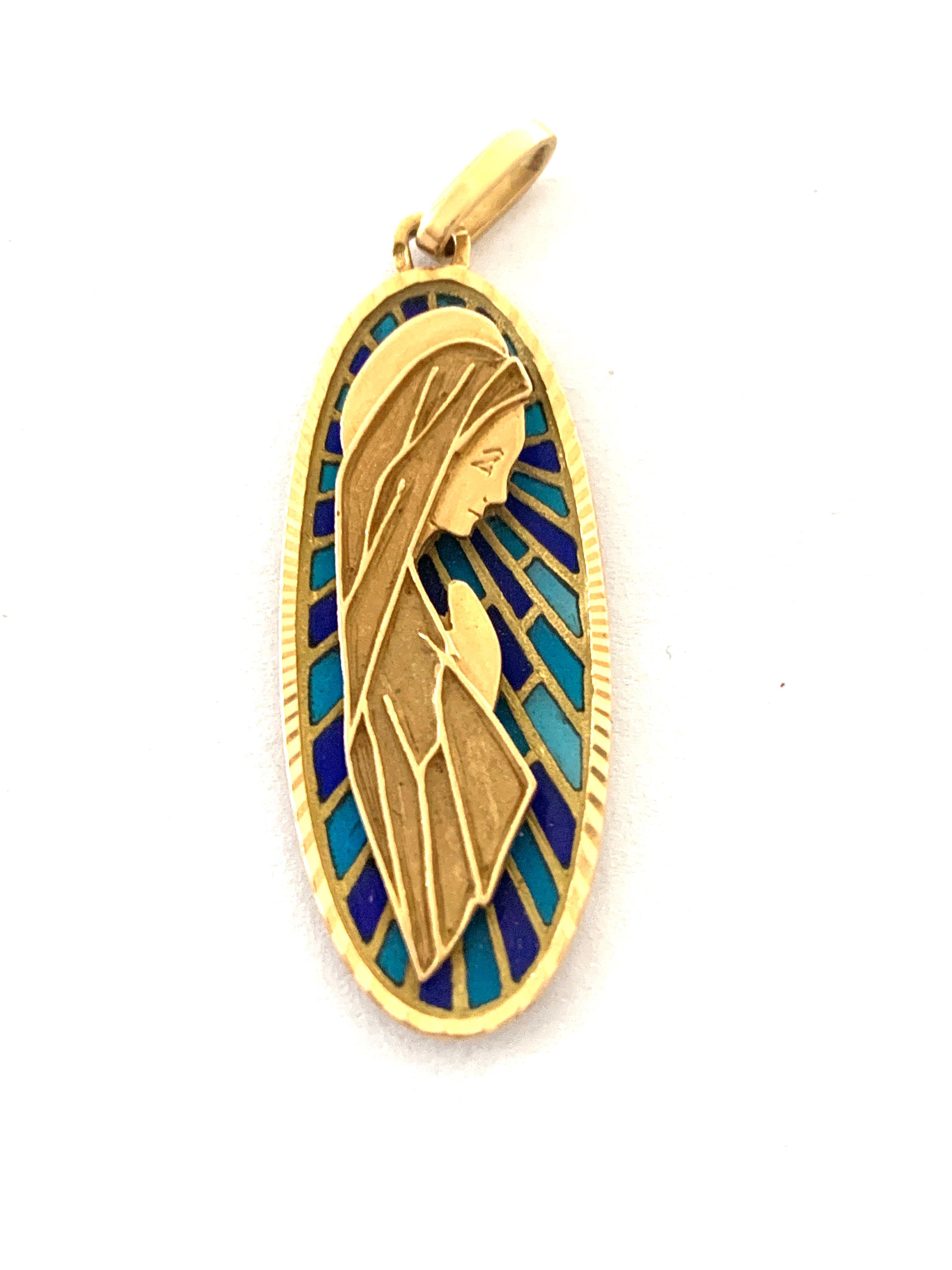 18ct Gold French Virgin Mary Pendant 
Colourful Aqua & Colbalt Blue surrounding enamel Enamel 
Stamped to the bail with the 
French Eagle mark for 18ct Gold 
Height  4.2 CM
Weight 4.3 Grams
