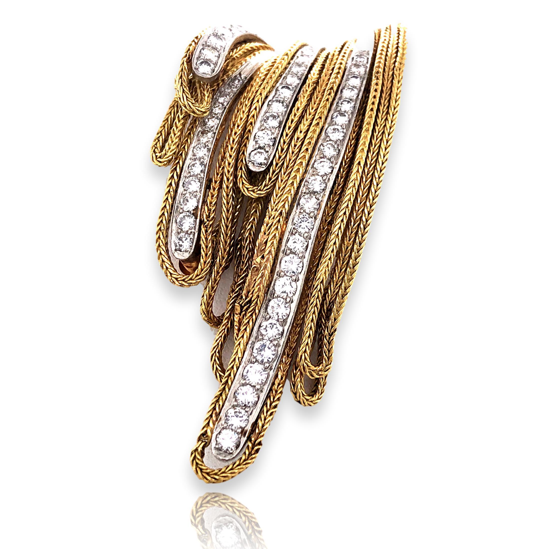 Gold and diamond French made brooch. The 18k yellow gold 2 3/8