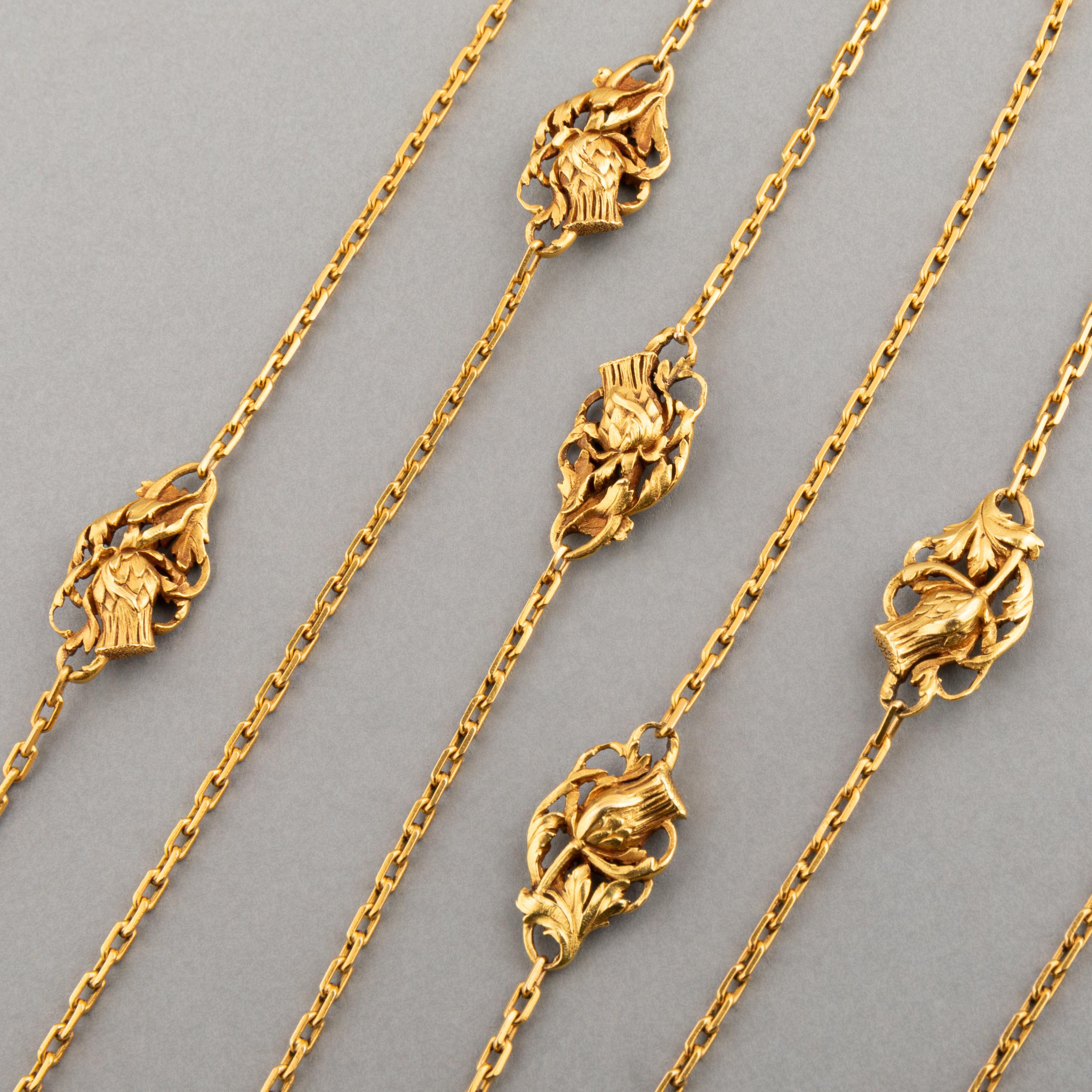 A very beautiful antique necklace, made in France circa 1890.

Made in yellow gold 20K (Mercure's Head with number 2). it is rare to found 20k antique French jewellery.

The length is 160cm or 3 turns. The Flower parterns measures