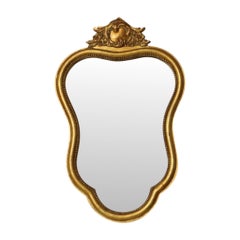 Espejo francés de estilo barroco dorado con cresta