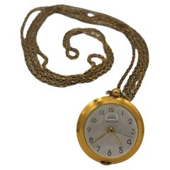 Orologio francese con ciondolo a bolla d'oro e vista scheletrica di Avril con catena d'oro 14K