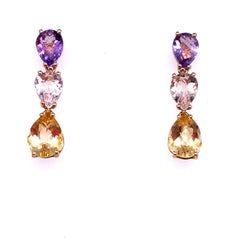 French Gold Earrings accompanied by 3 Stones an Amethyst a Beryl and a Citrine