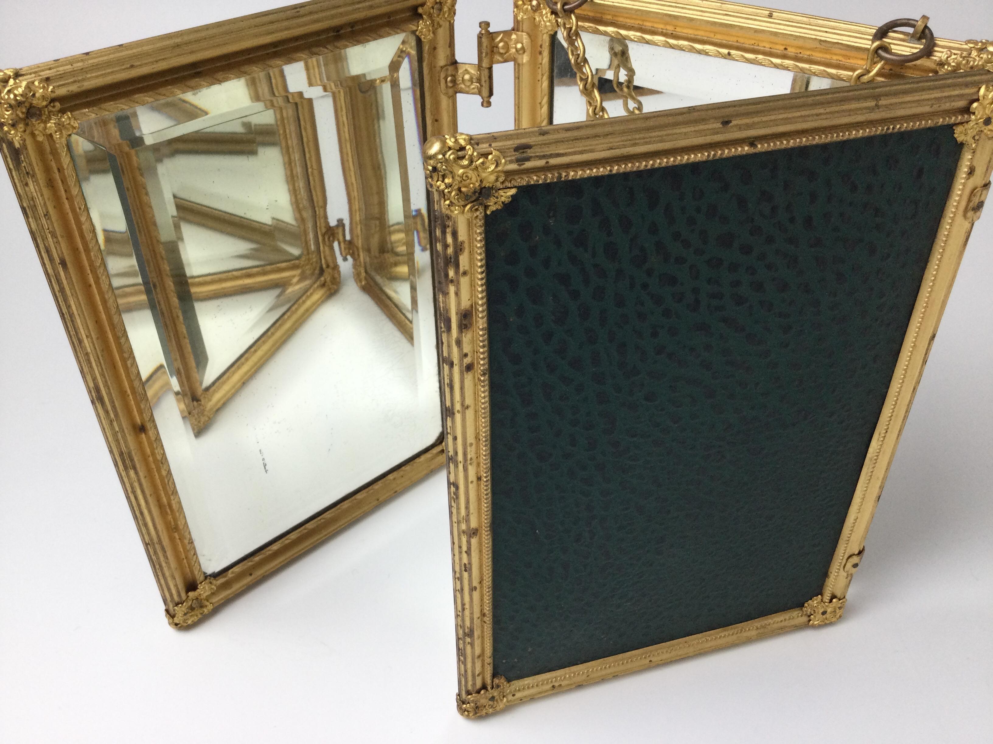 trifold gold mirror